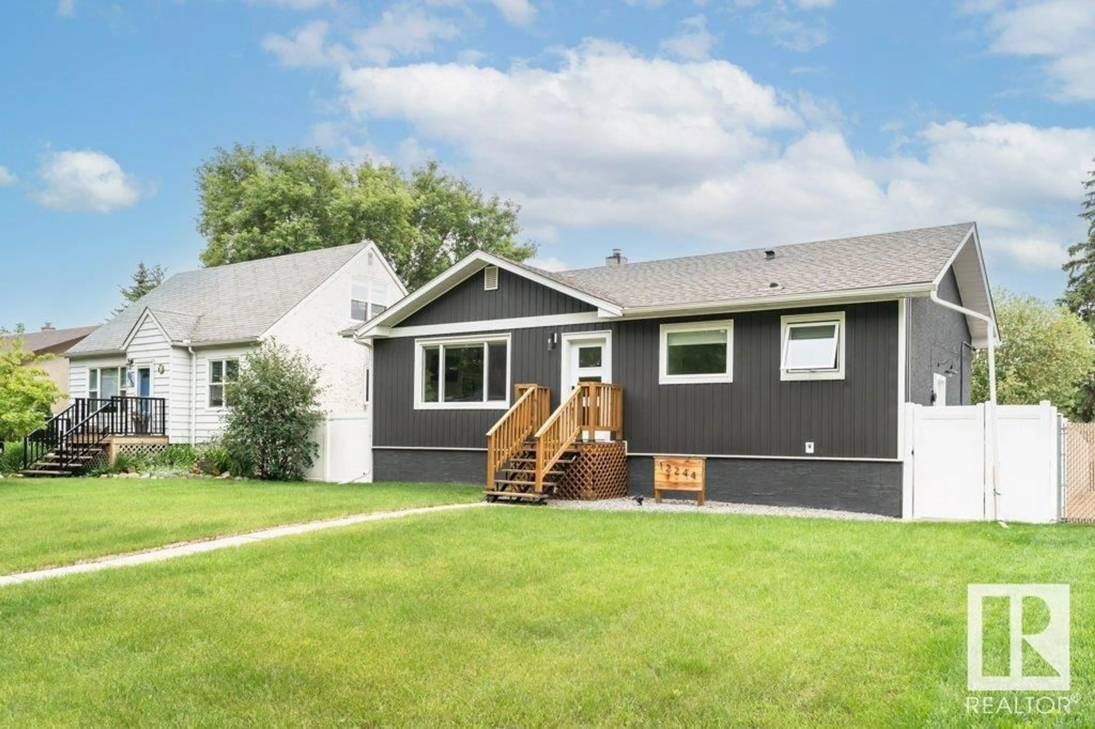 Home with vinyl exterior material, street for 12244 135 ST, Edmonton Alberta T5L1X1