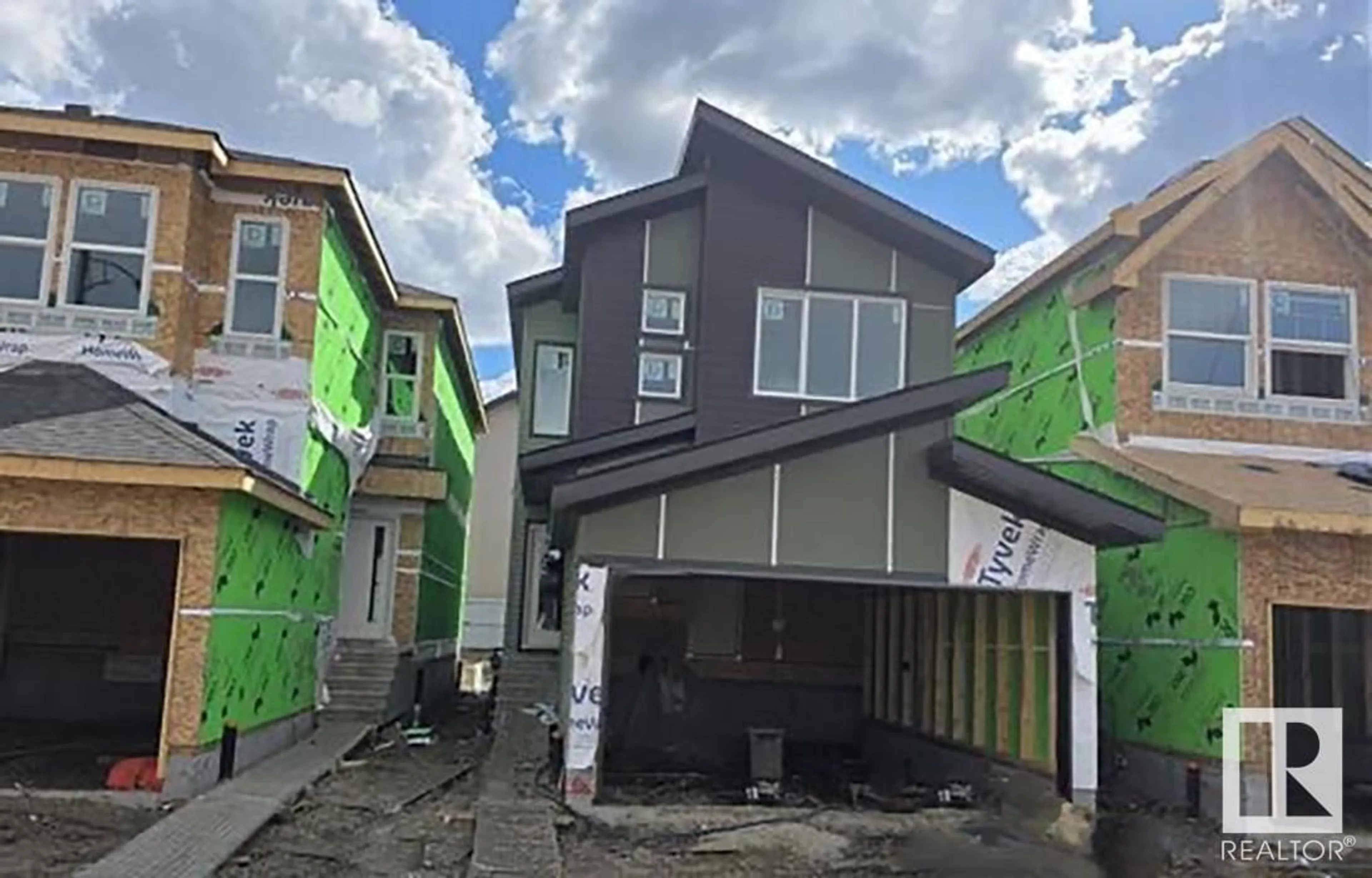 Home with vinyl exterior material, street for 8511 181 AV, Edmonton Alberta T5Z0X1