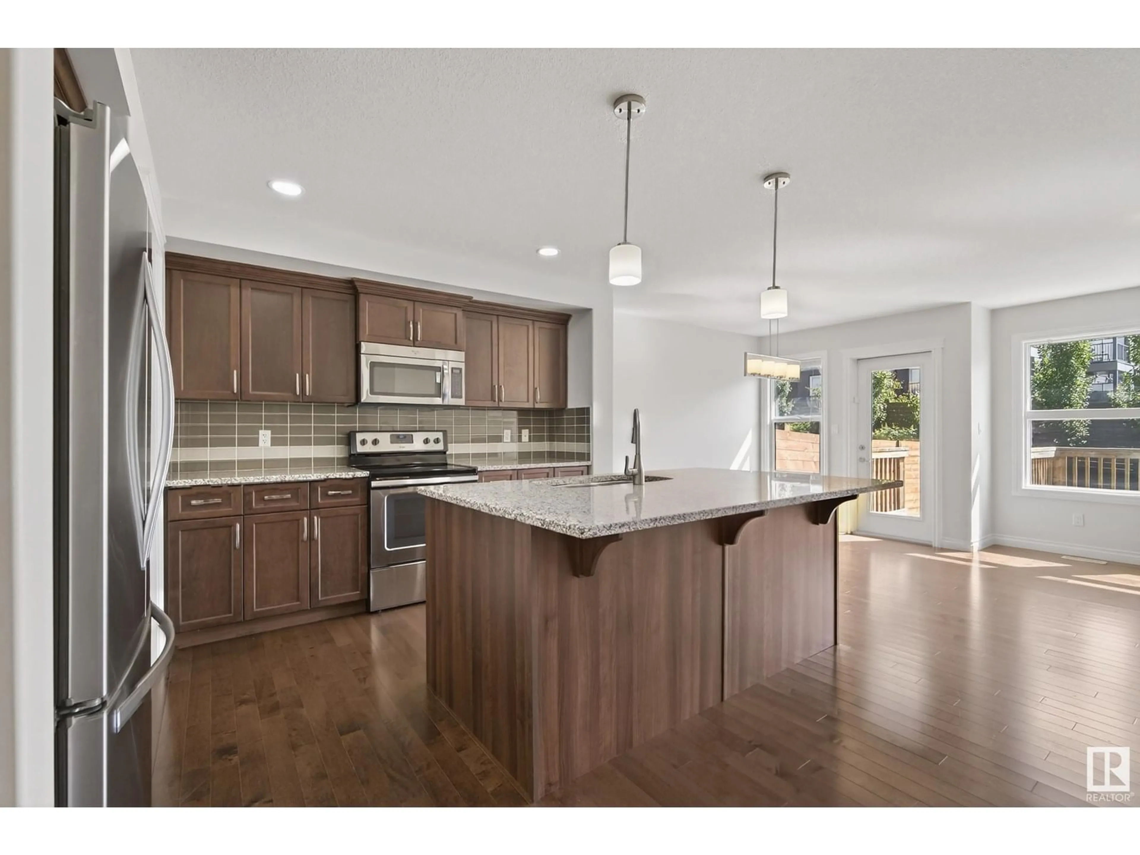 Open concept kitchen, unknown for 2311 WARE CR, Edmonton Alberta T6W2W4