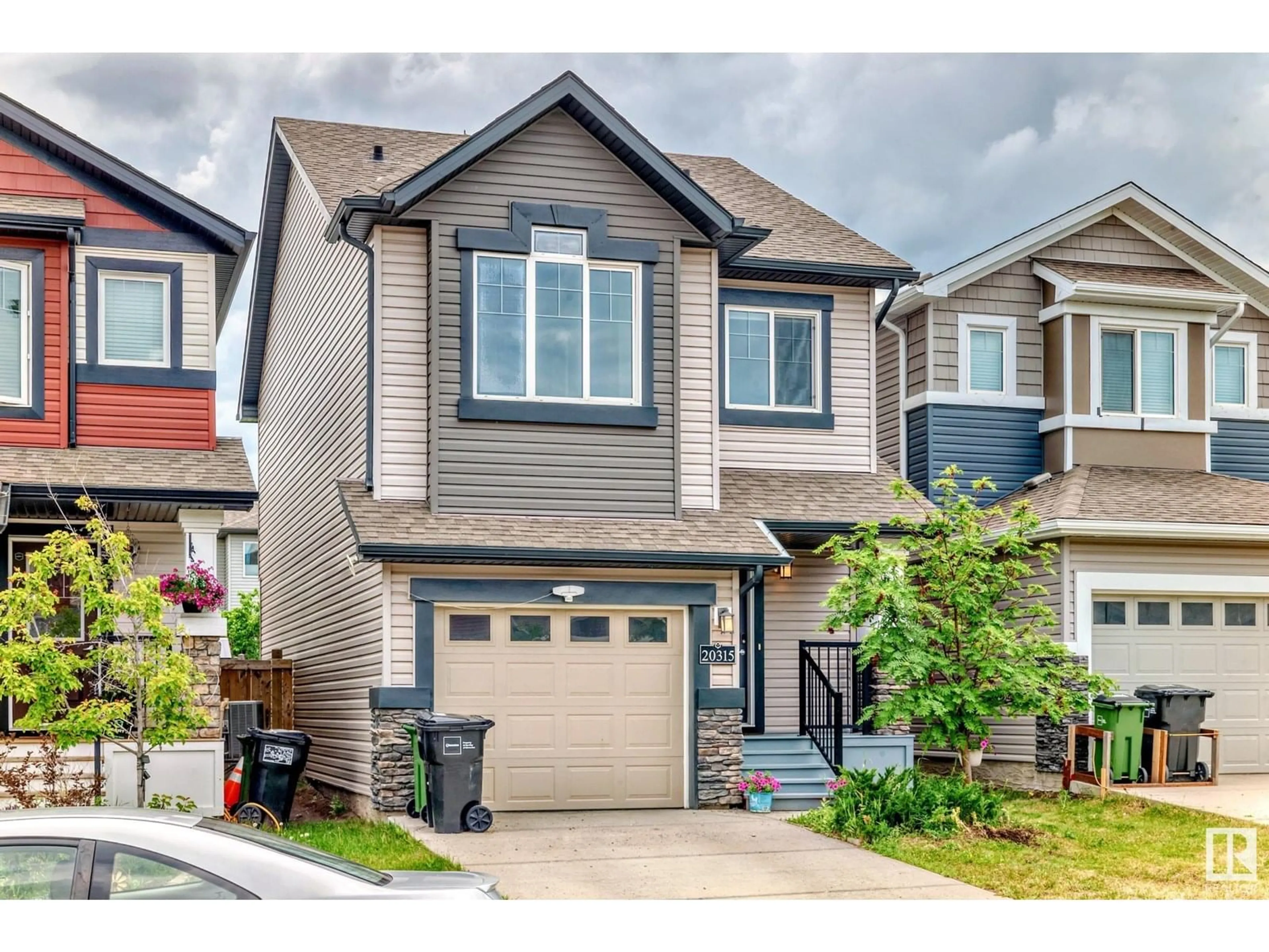 Home with vinyl exterior material, street for 20315 43 AV NW, Edmonton Alberta T6M0R8