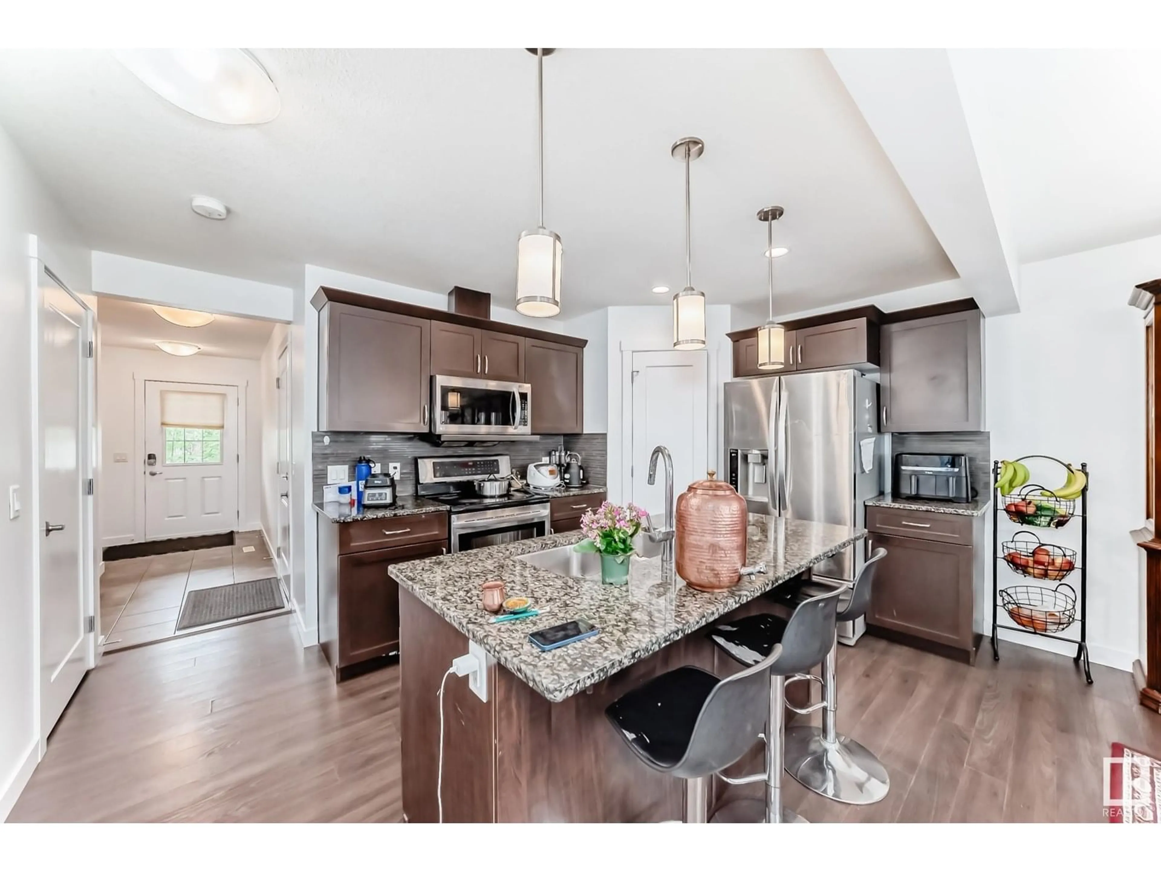 Open concept kitchen, unknown for 20315 43 AV NW, Edmonton Alberta T6M0R8