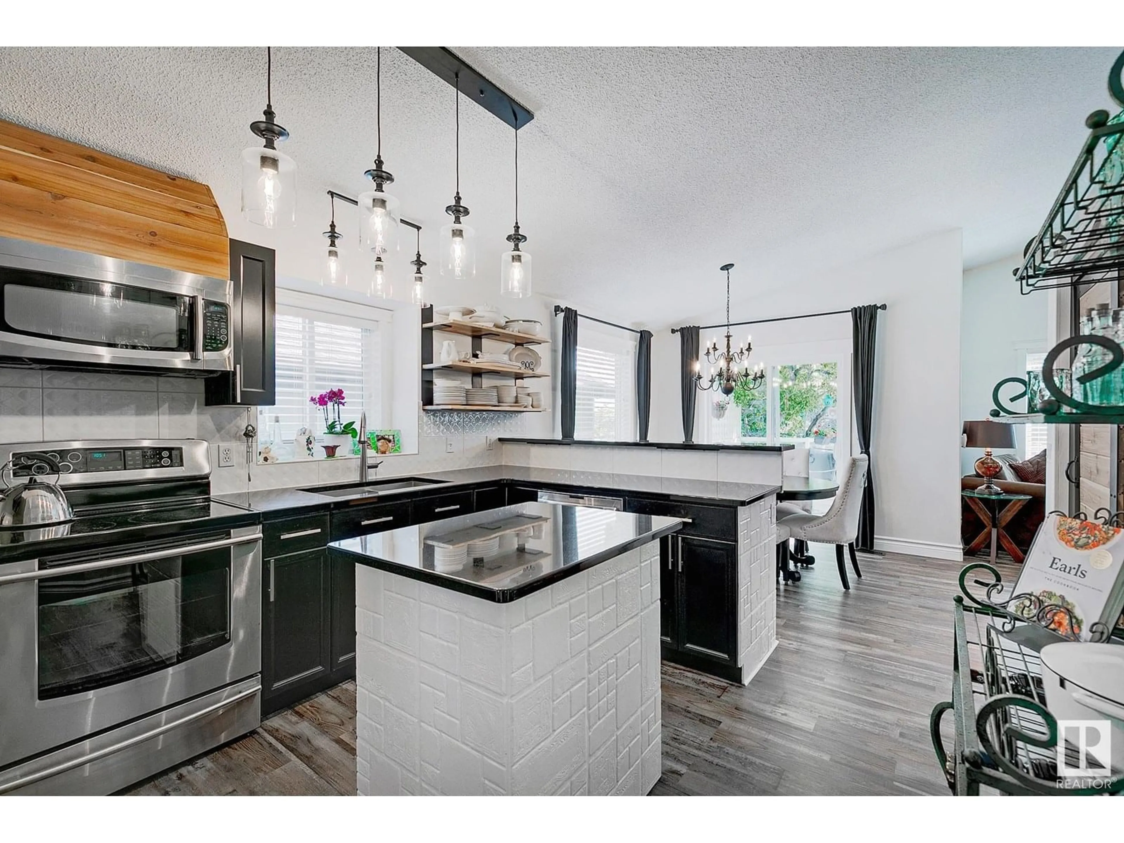 Open concept kitchen, ceramic/tile floor for NW - 15003 128 ST, Edmonton Alberta T6V1E9