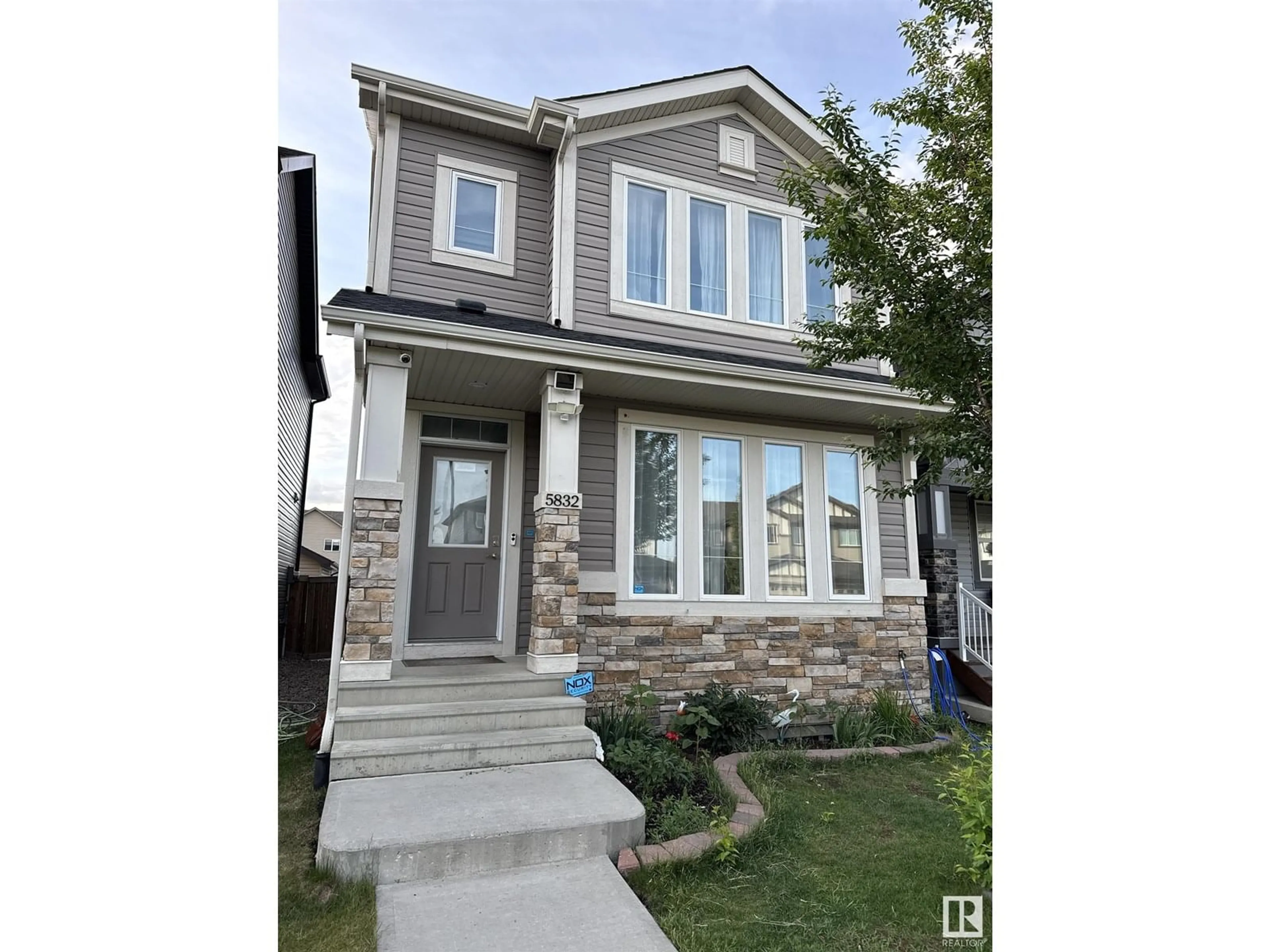 Home with vinyl exterior material, street for 5832 ANTHONY CR, Edmonton Alberta T6W3H5
