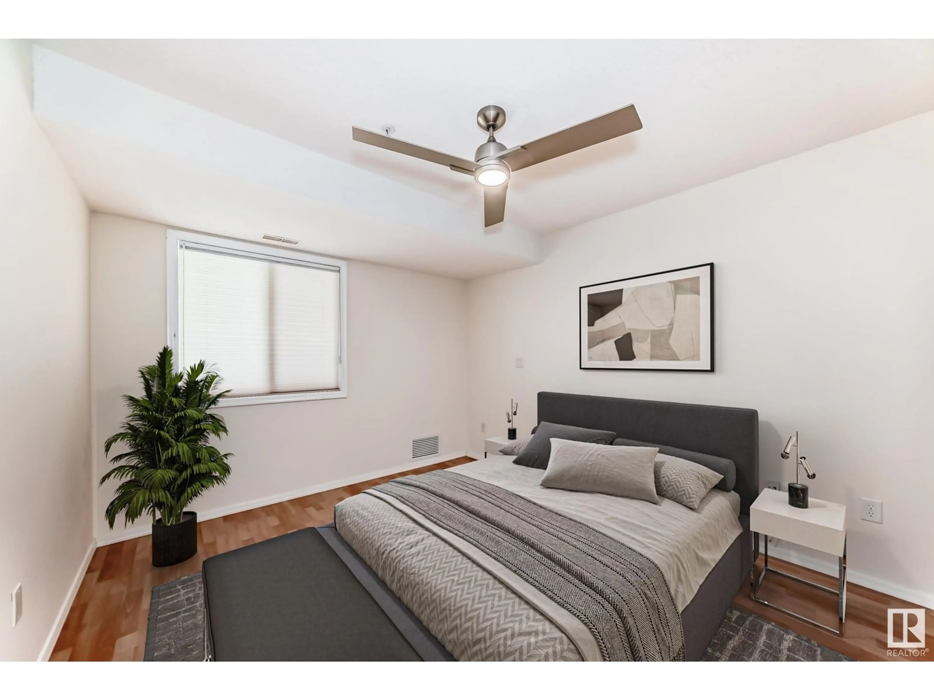 A pic of a room for #102 - 9008 99 AV, Edmonton Alberta T5H4M6