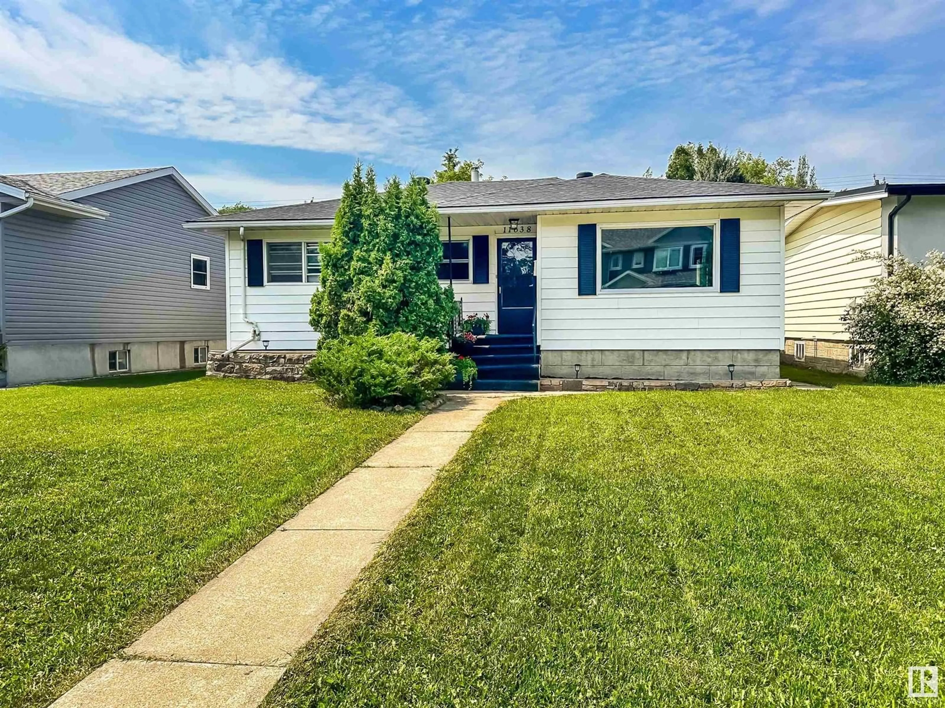 Home with vinyl exterior material, street for NW - 11638 133 ST, Edmonton Alberta T5M1H5