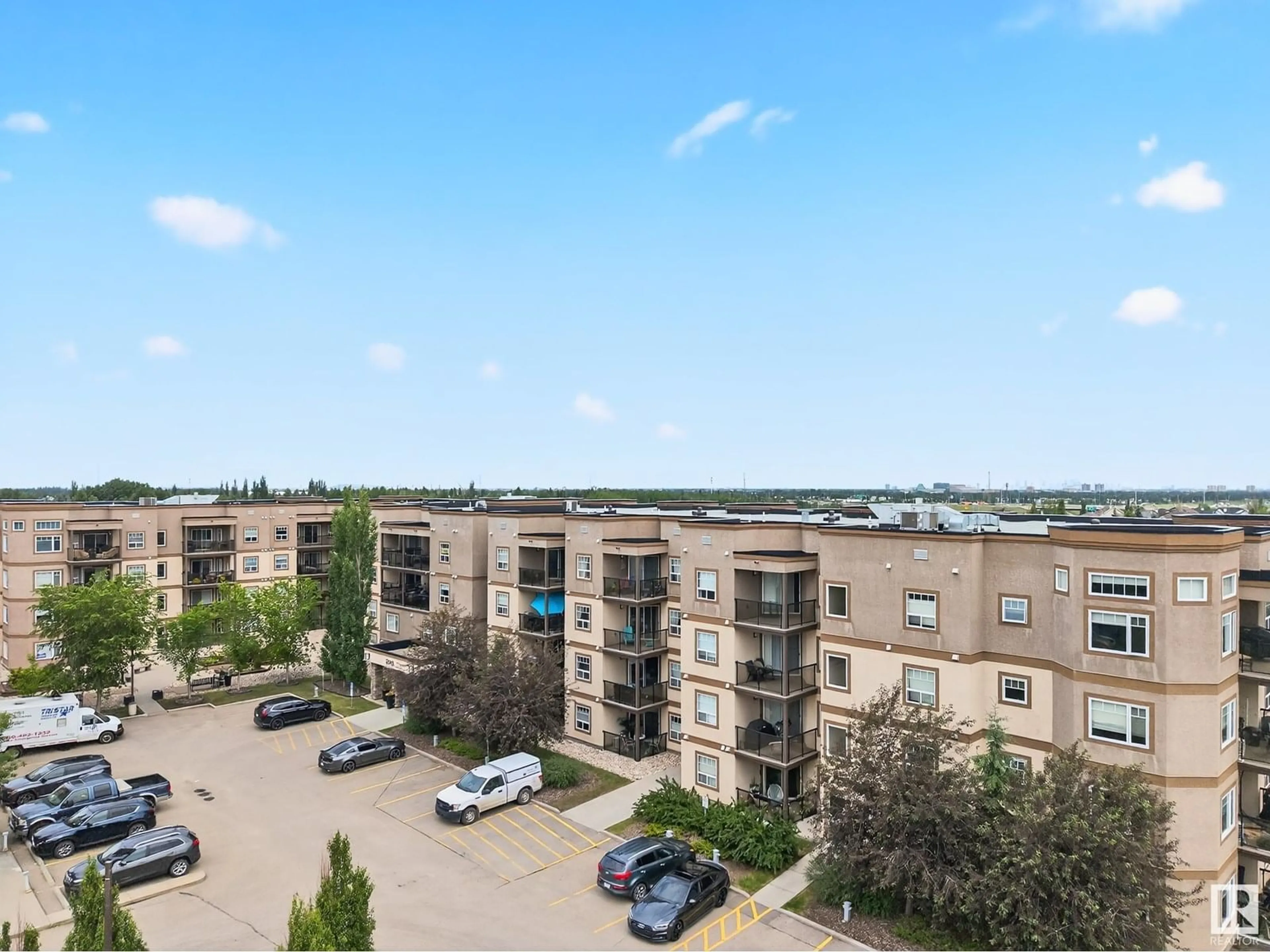 A pic from outside/outdoor area/front of a property/back of a property/a pic from drone, city buildings view from balcony for #125 - 2045 GRANTHAM CO, Edmonton Alberta T5T3X6