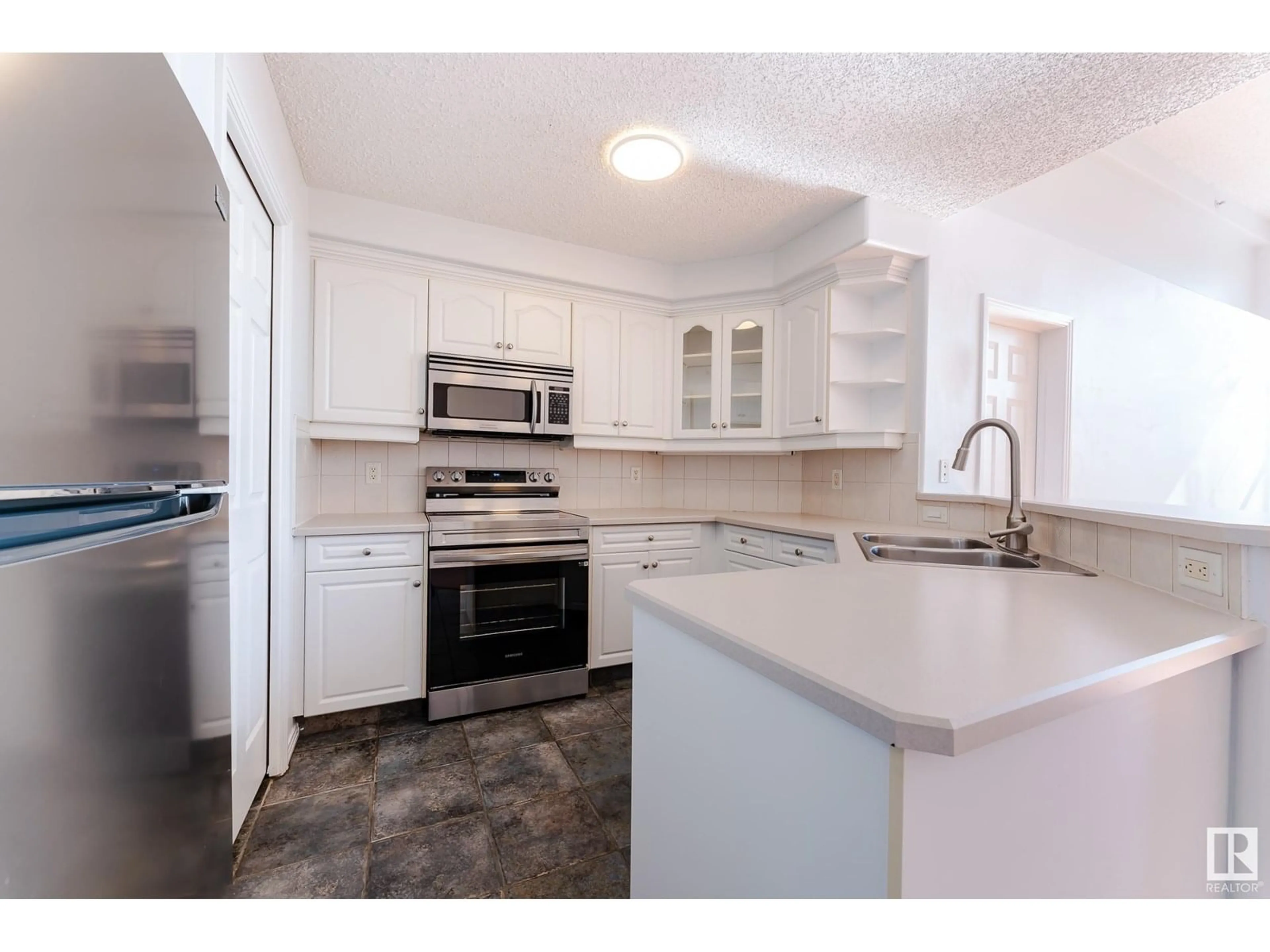 Standard kitchen, ceramic/tile floor for 433 - 9704 174 ST NW, Edmonton Alberta T5T6J4