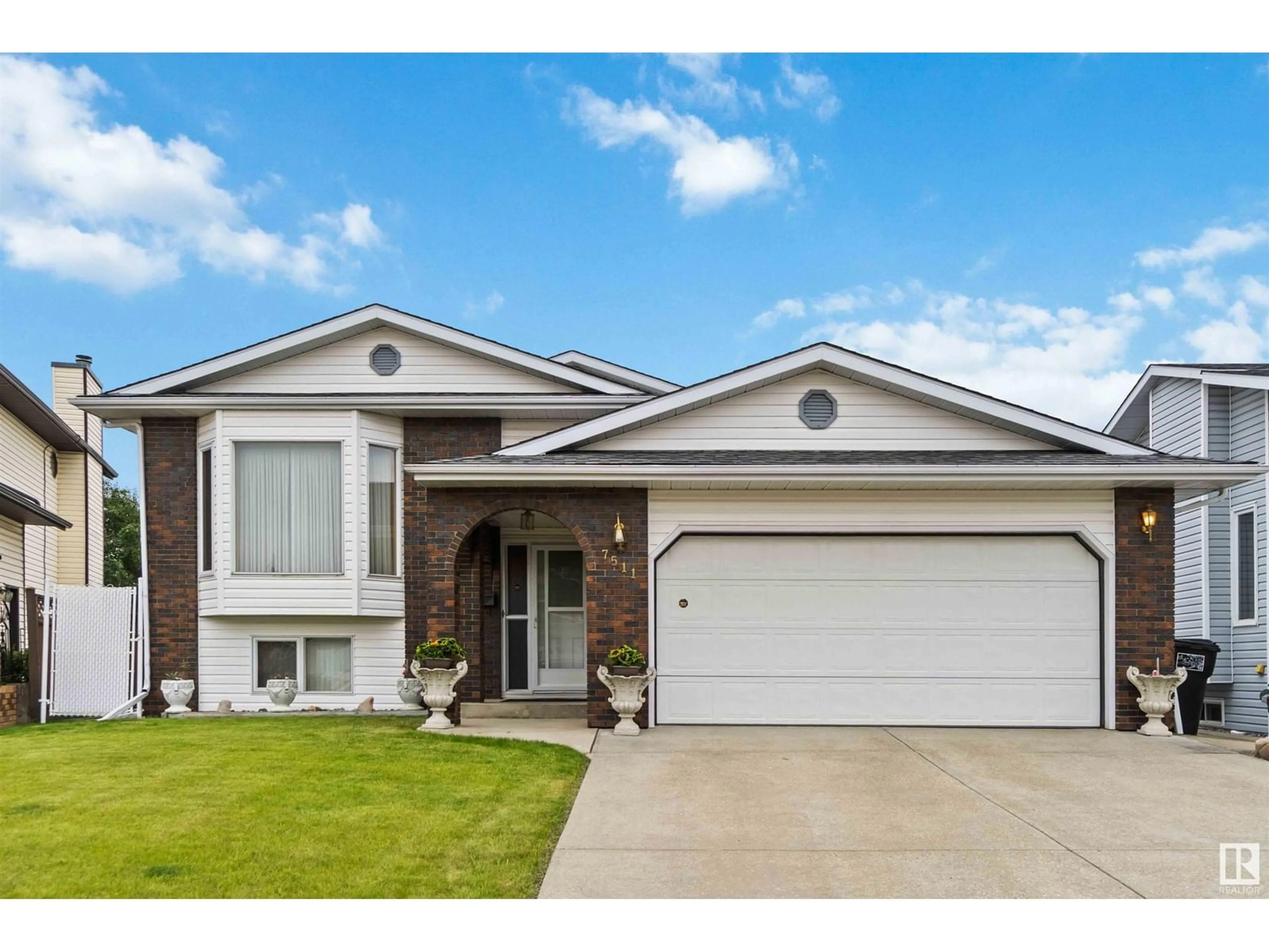 Home with vinyl exterior material, street for 7511 158 A AV, Edmonton Alberta T5Z2W4