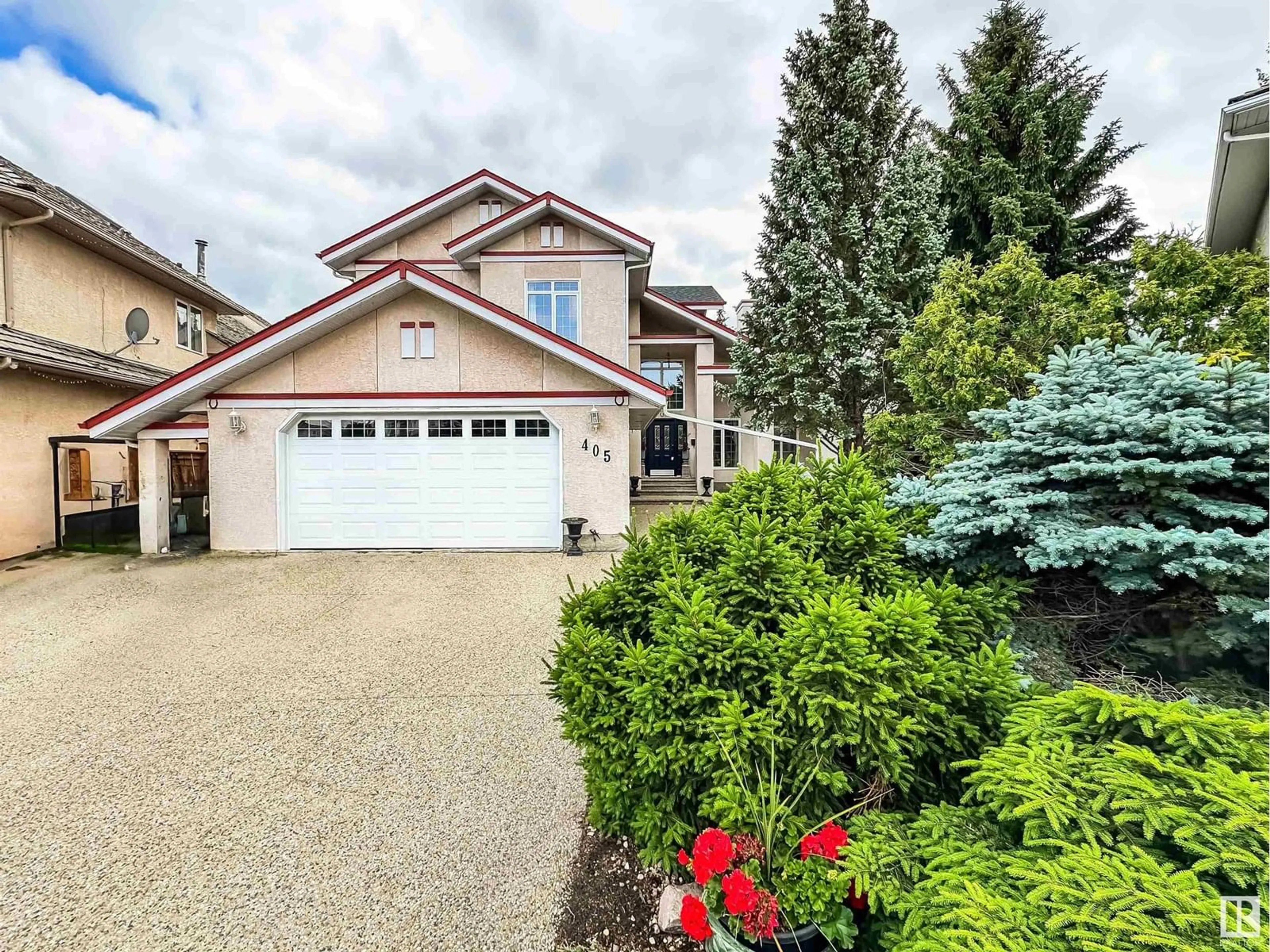 Home with vinyl exterior material, street for 405 KULAWY GA, Edmonton Alberta T6L6Z1
