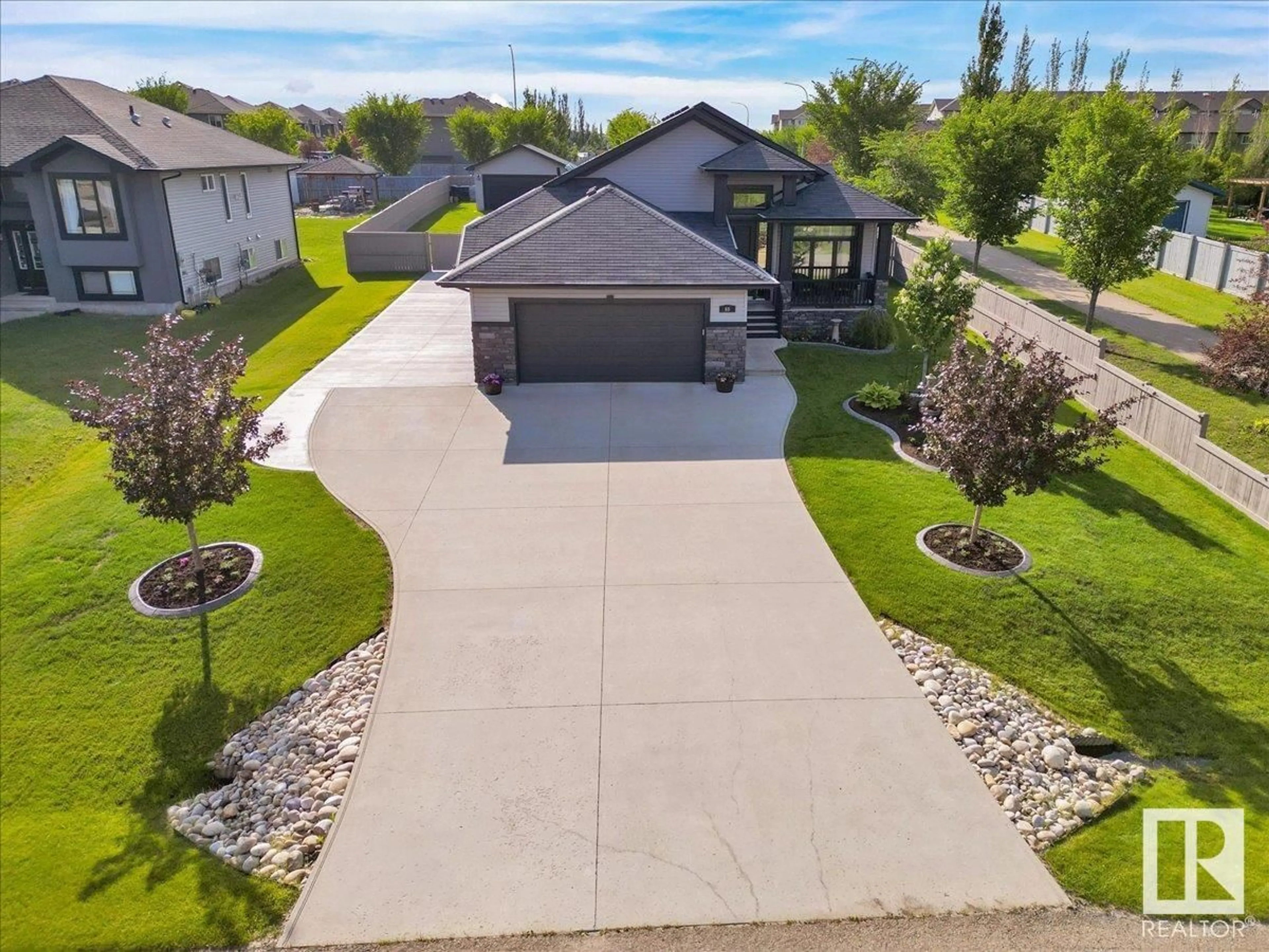 A pic from outside/outdoor area/front of a property/back of a property/a pic from drone, street for 66 GREENFIELD WD, Fort Saskatchewan Alberta T8L0P1