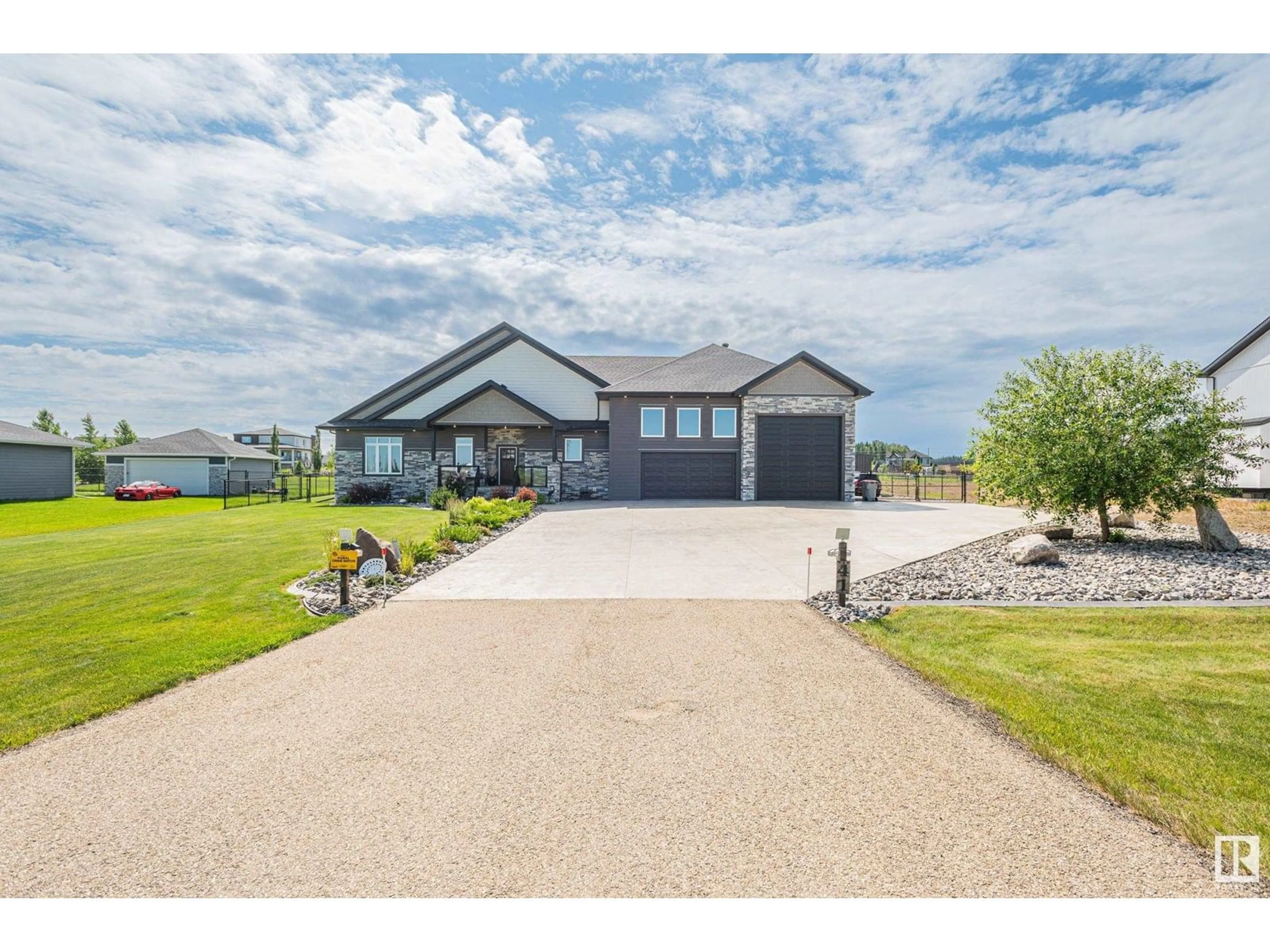 A pic from outside/outdoor area/front of a property/back of a property/a pic from drone, unknown for 41 - 26409 TWP ROAD 532 A, Rural Parkland County Alberta T7X0W7