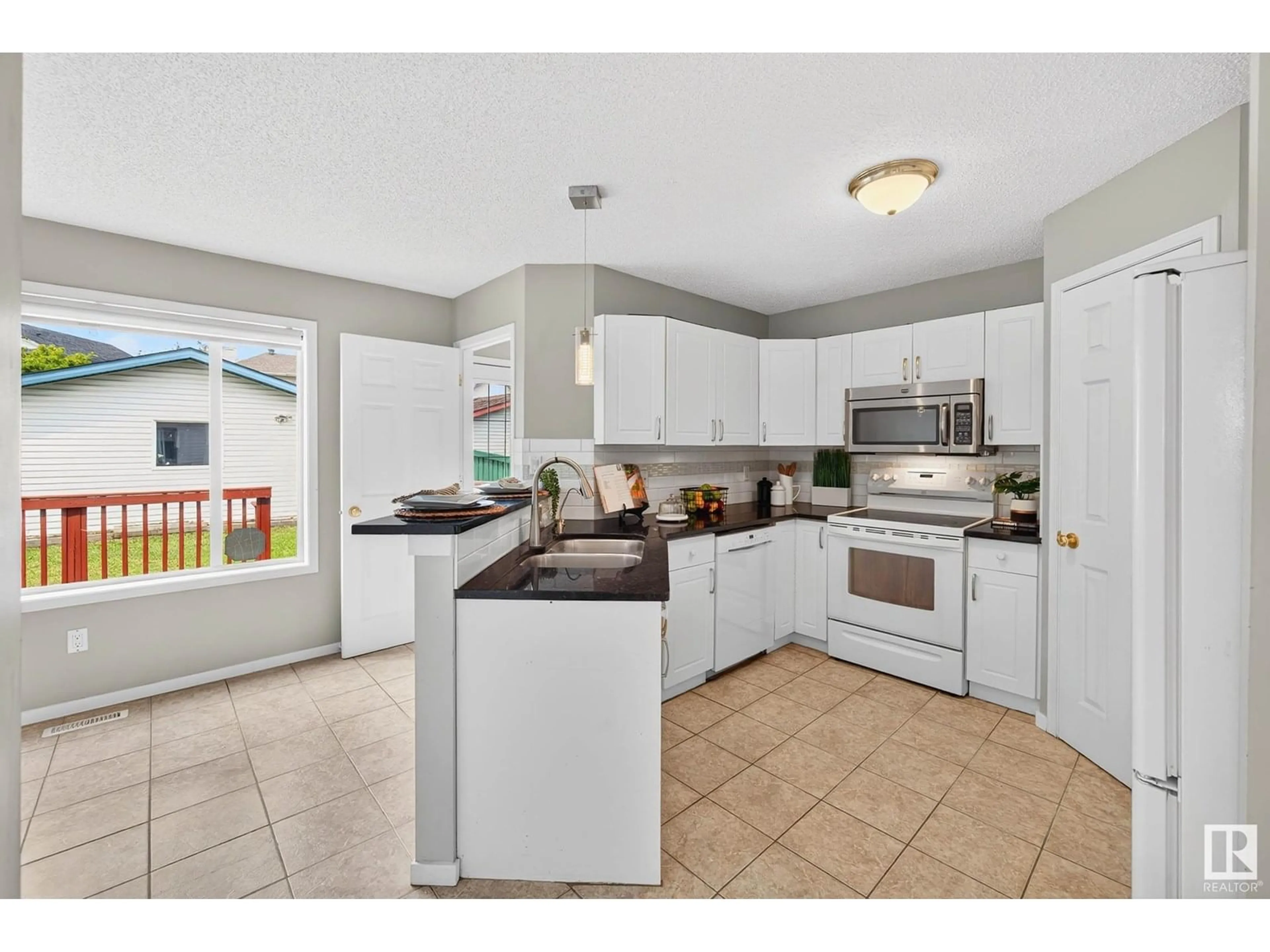 Open concept kitchen, ceramic/tile floor for 1338 GRANT WY, Edmonton Alberta T5T6M8