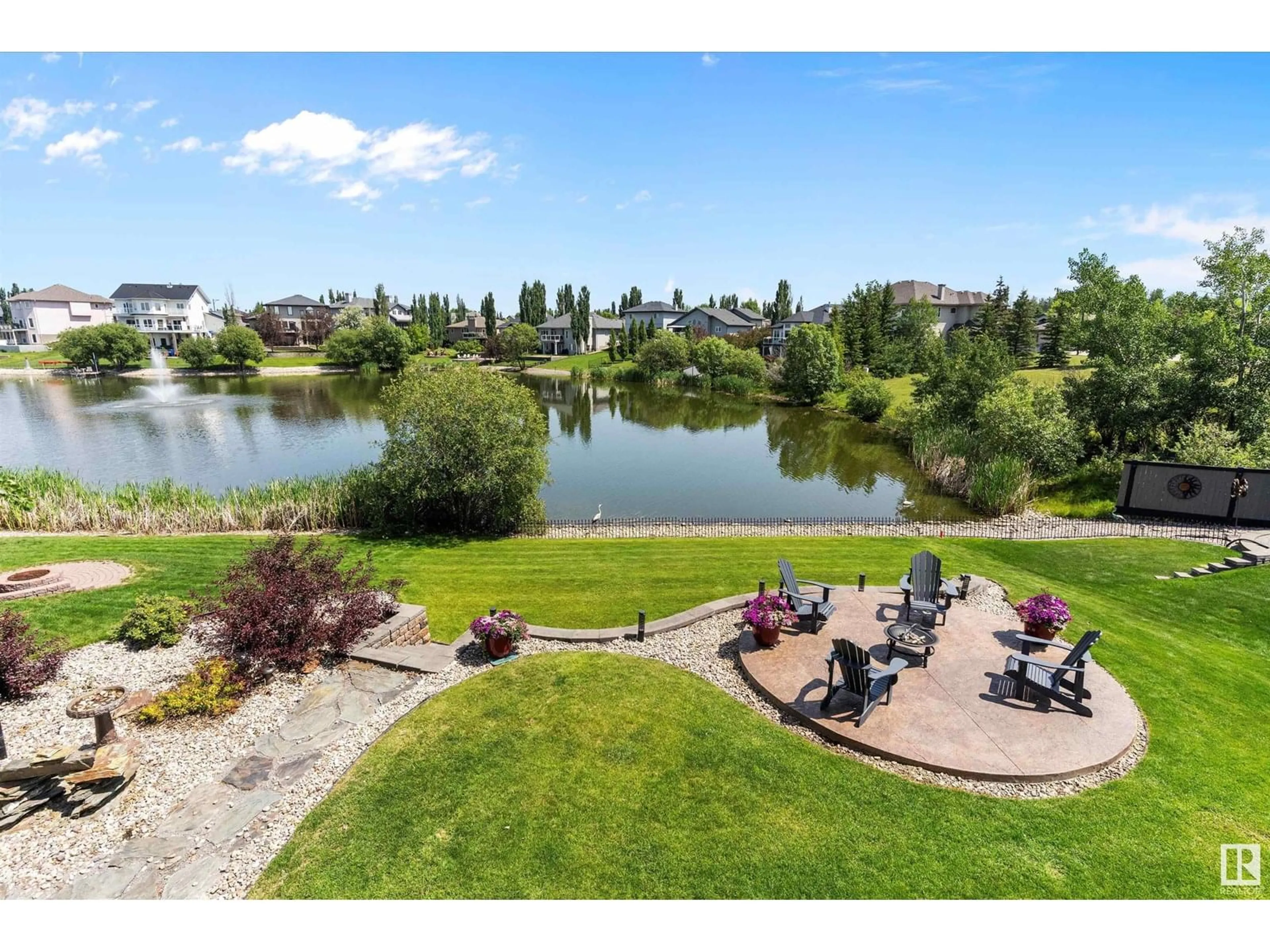 A pic from outside/outdoor area/front of a property/back of a property/a pic from drone, water/lake/river/ocean view for 82 SHORES DR, Leduc Alberta T9E8N7