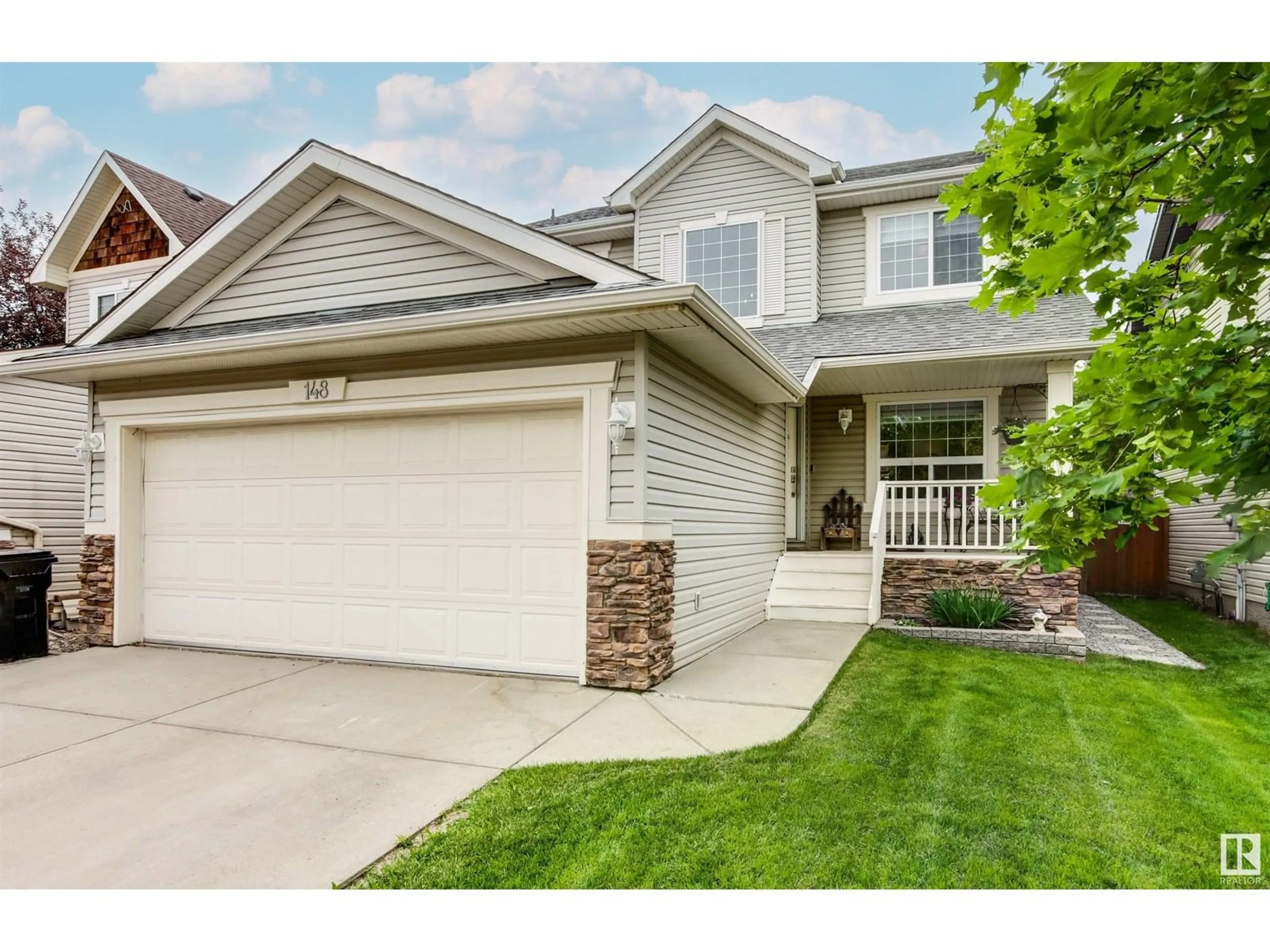 Home with vinyl exterior material, street for 148 CORNWALL RD, Sherwood Park Alberta T8H2L9