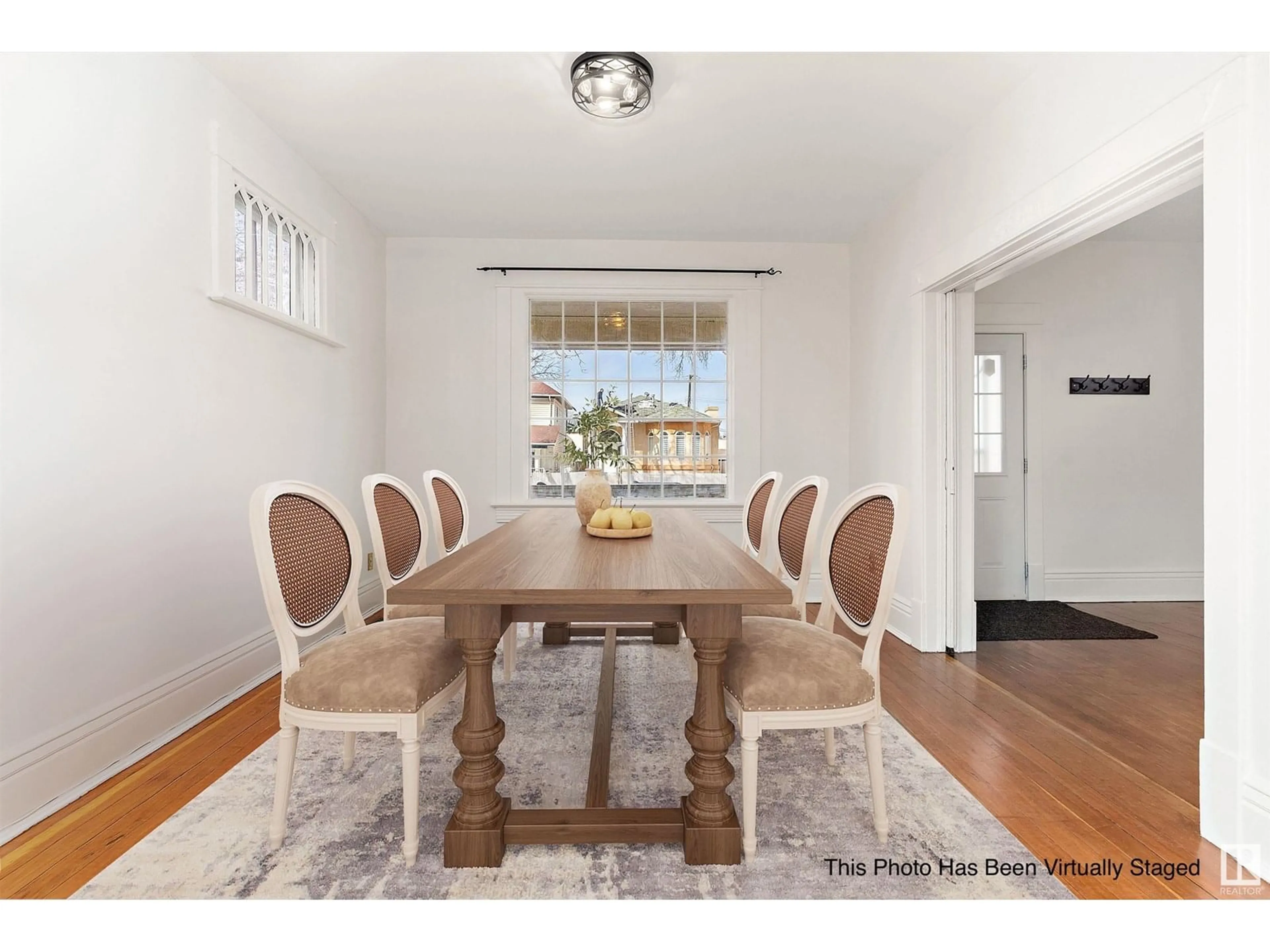 Dining room, wood/laminate floor for 9617 107 AV NW, Edmonton Alberta T5H0T8