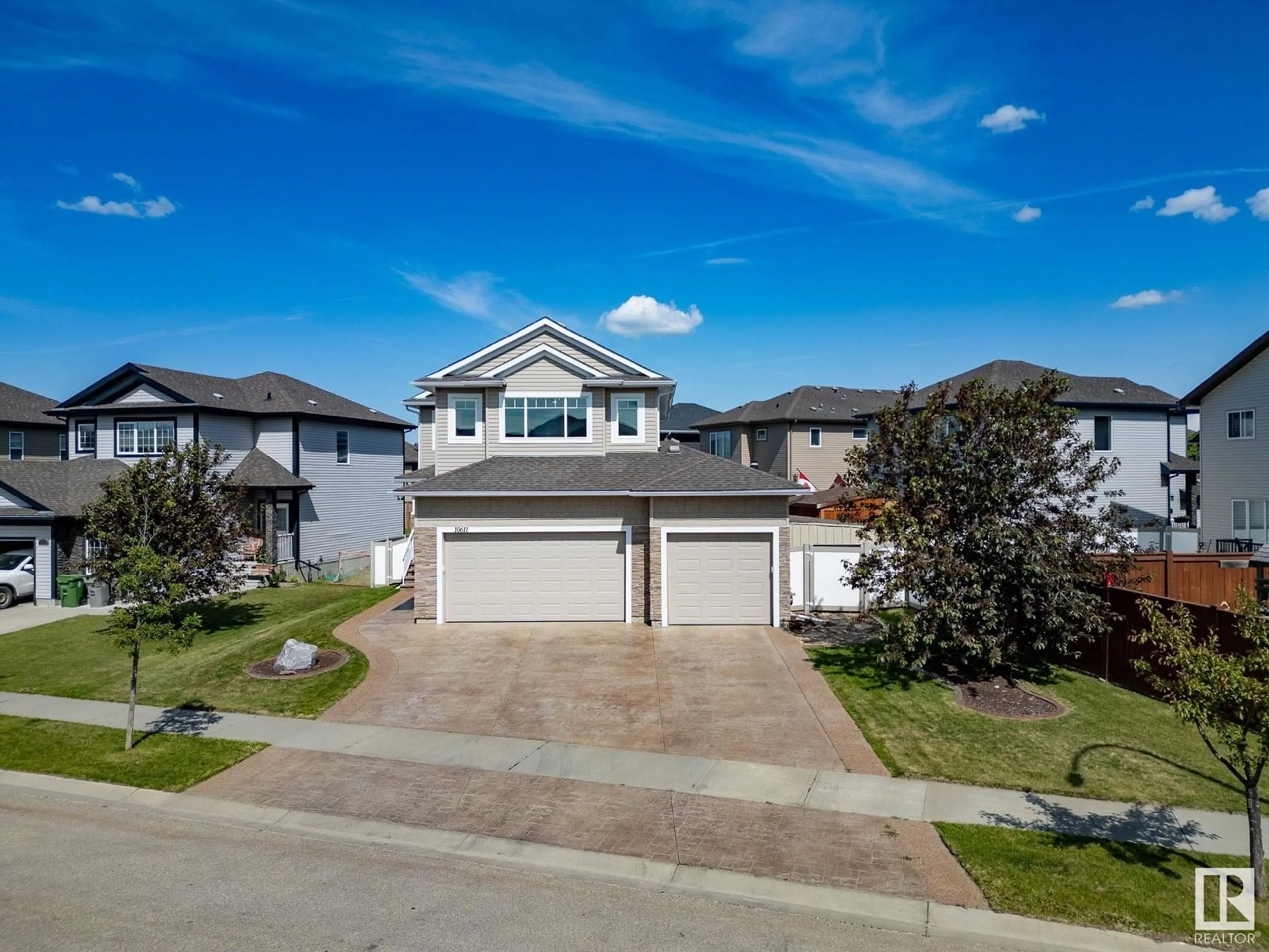 A pic from outside/outdoor area/front of a property/back of a property/a pic from drone, street for 10611 97 ST, Morinville Alberta T8R0B8