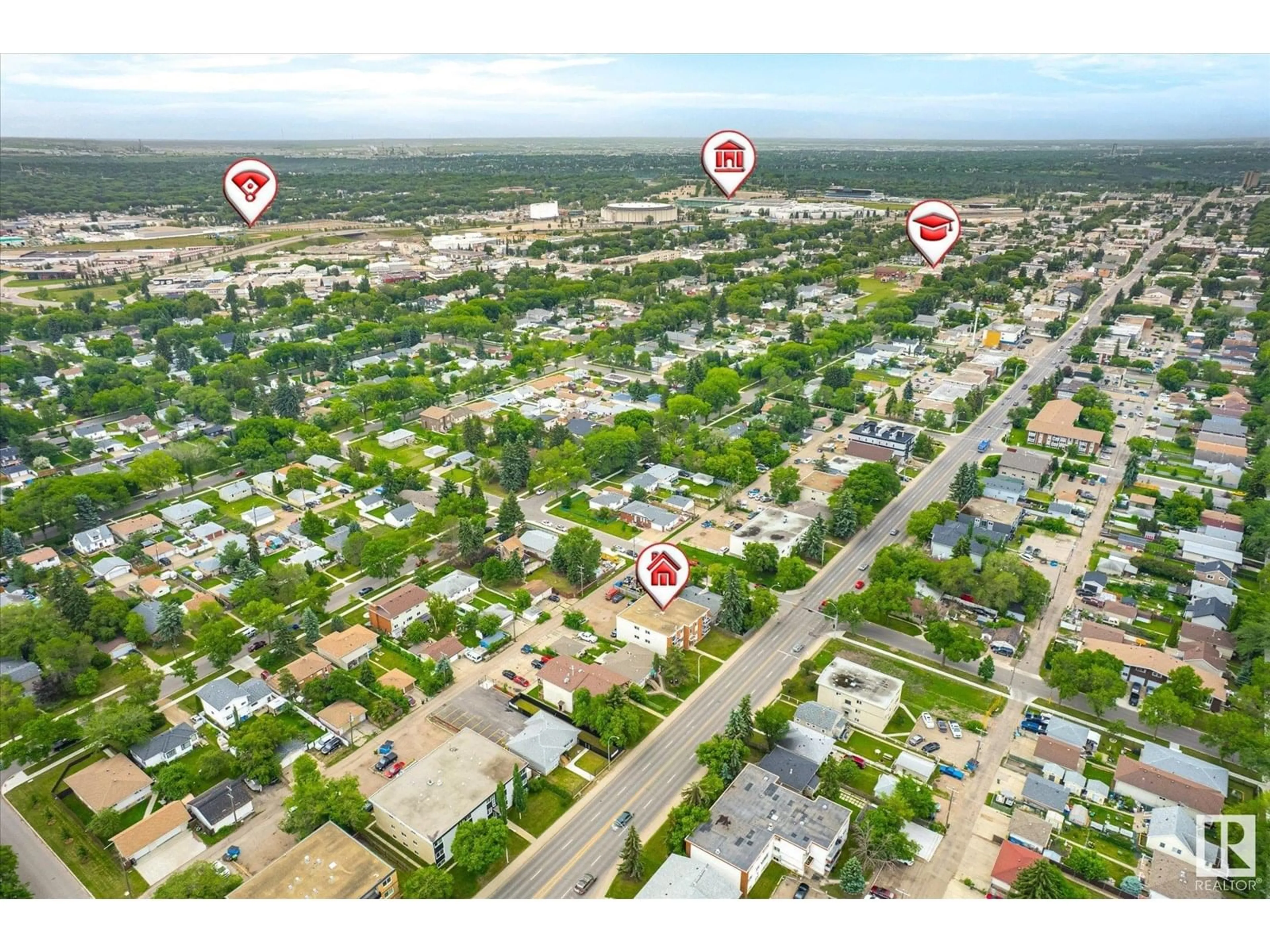 A pic from outside/outdoor area/front of a property/back of a property/a pic from drone, street for #103 - 12409 82 ST, Edmonton Alberta T5B2X5