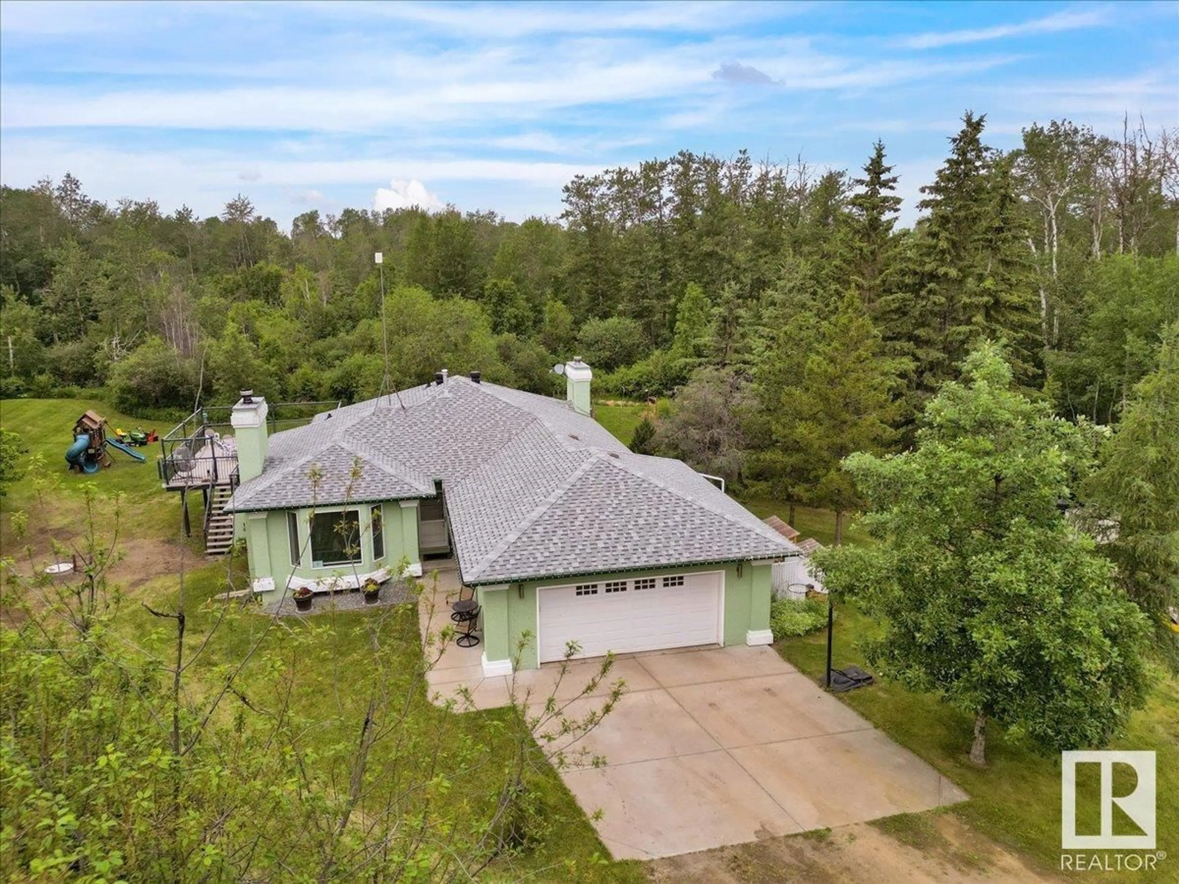 A pic from outside/outdoor area/front of a property/back of a property/a pic from drone, unknown for 110 - 50450 RGE ROAD 222, Rural Leduc County Alberta T0B3M0
