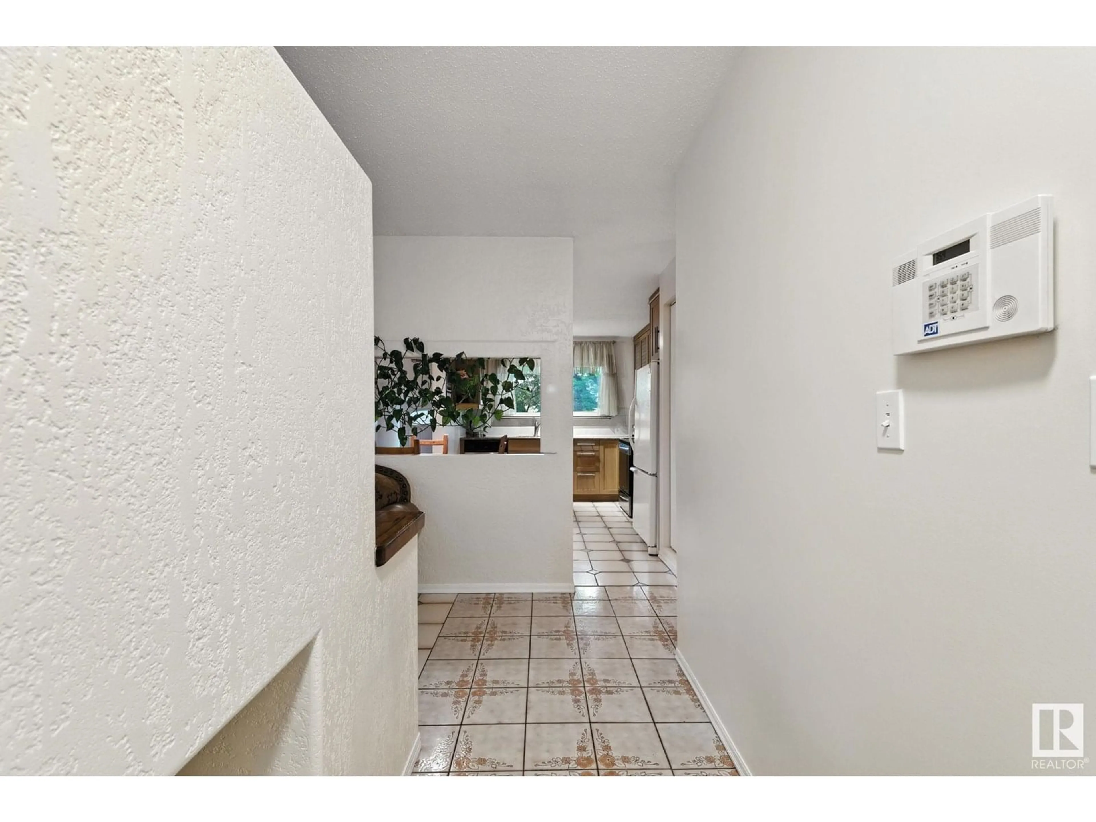 Indoor entryway for 11724 148 AV, Edmonton Alberta T5X1B6
