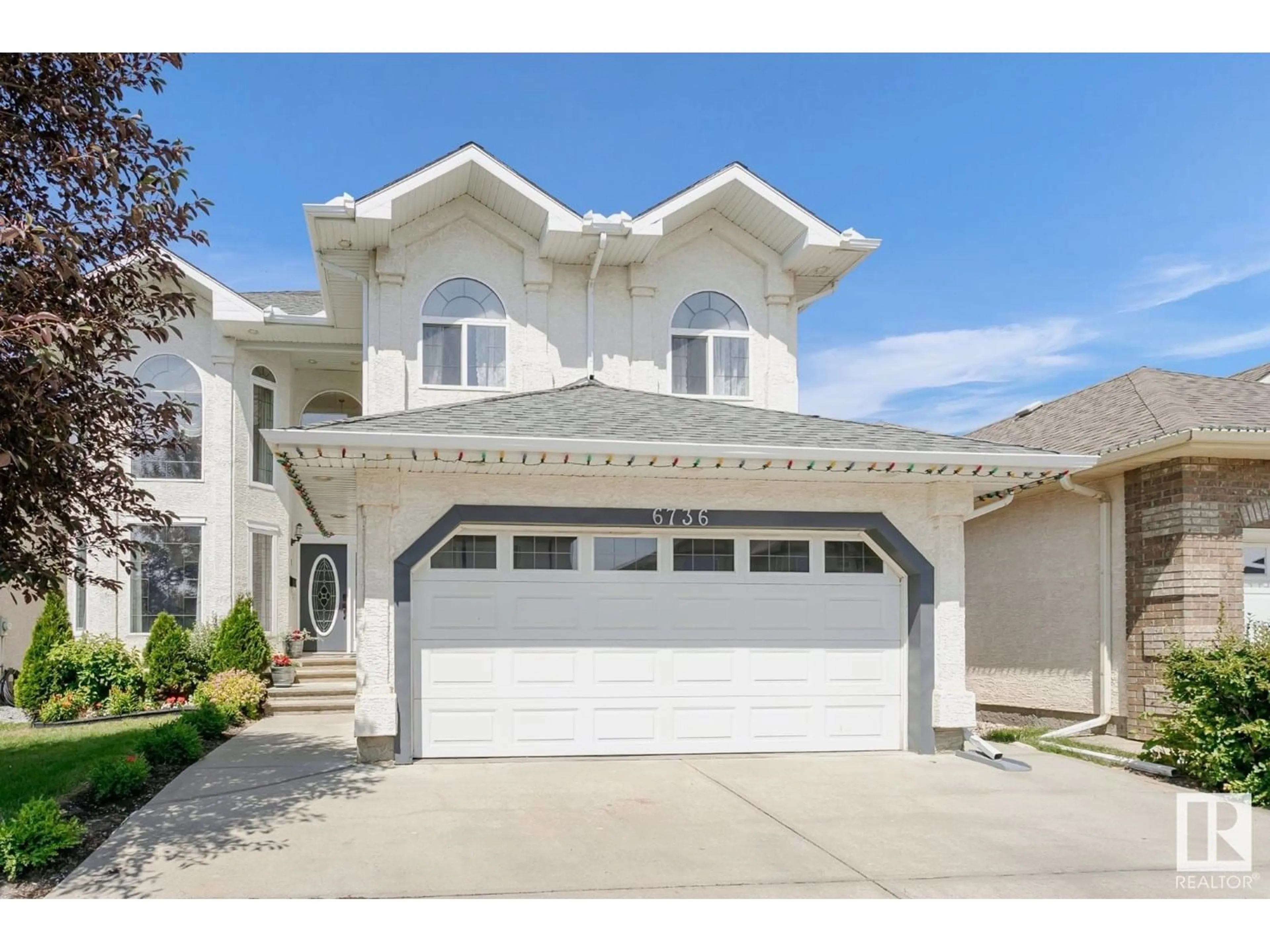 Home with vinyl exterior material, street for SW - 6736 11 AV, Edmonton Alberta T6X1L1