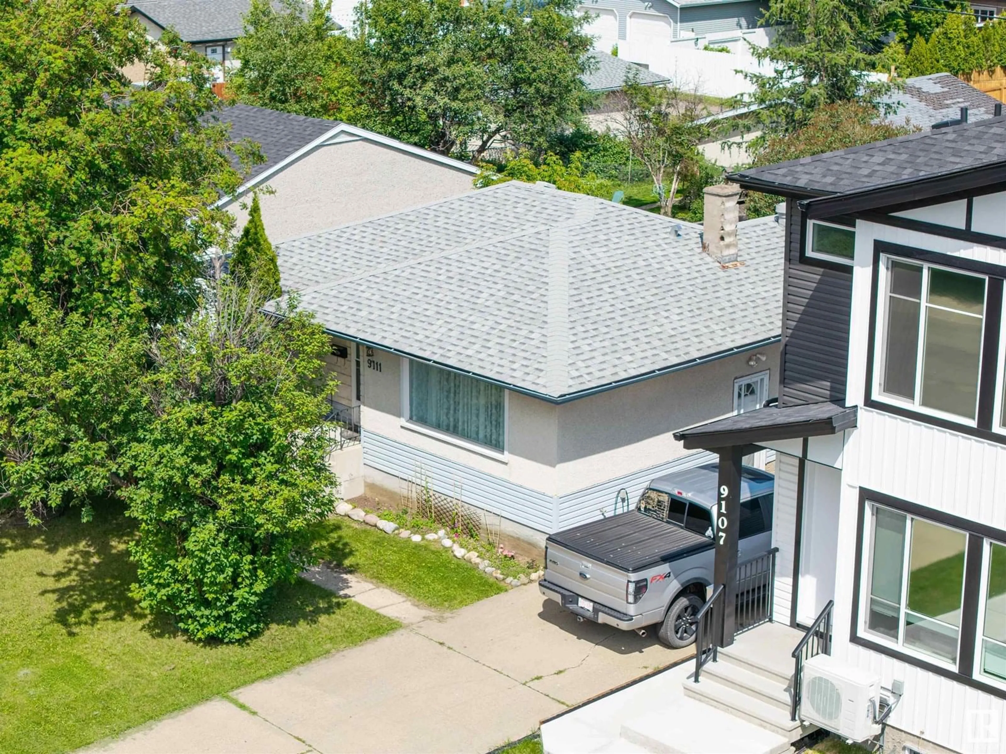 A pic from outside/outdoor area/front of a property/back of a property/a pic from drone, street for 9111 151 ST, Edmonton Alberta T5R1J5