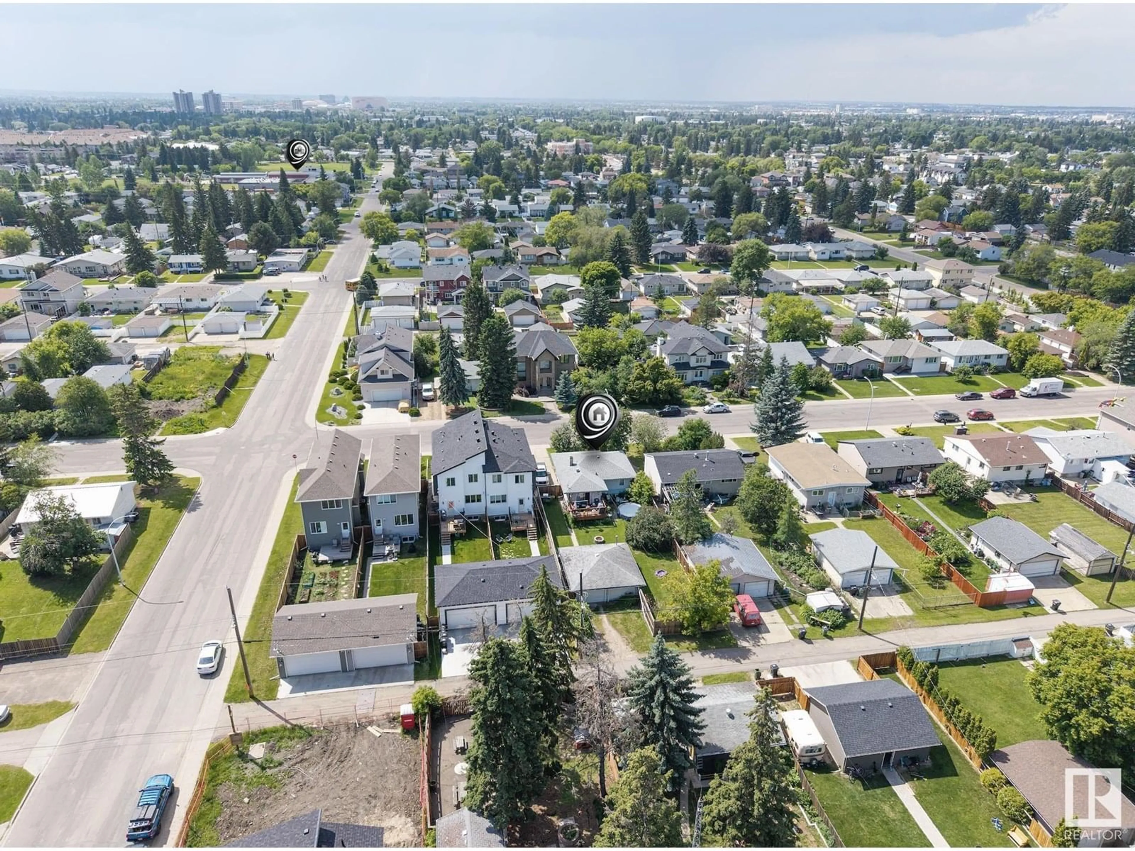 A pic from outside/outdoor area/front of a property/back of a property/a pic from drone, street for 9111 151 ST, Edmonton Alberta T5R1J5