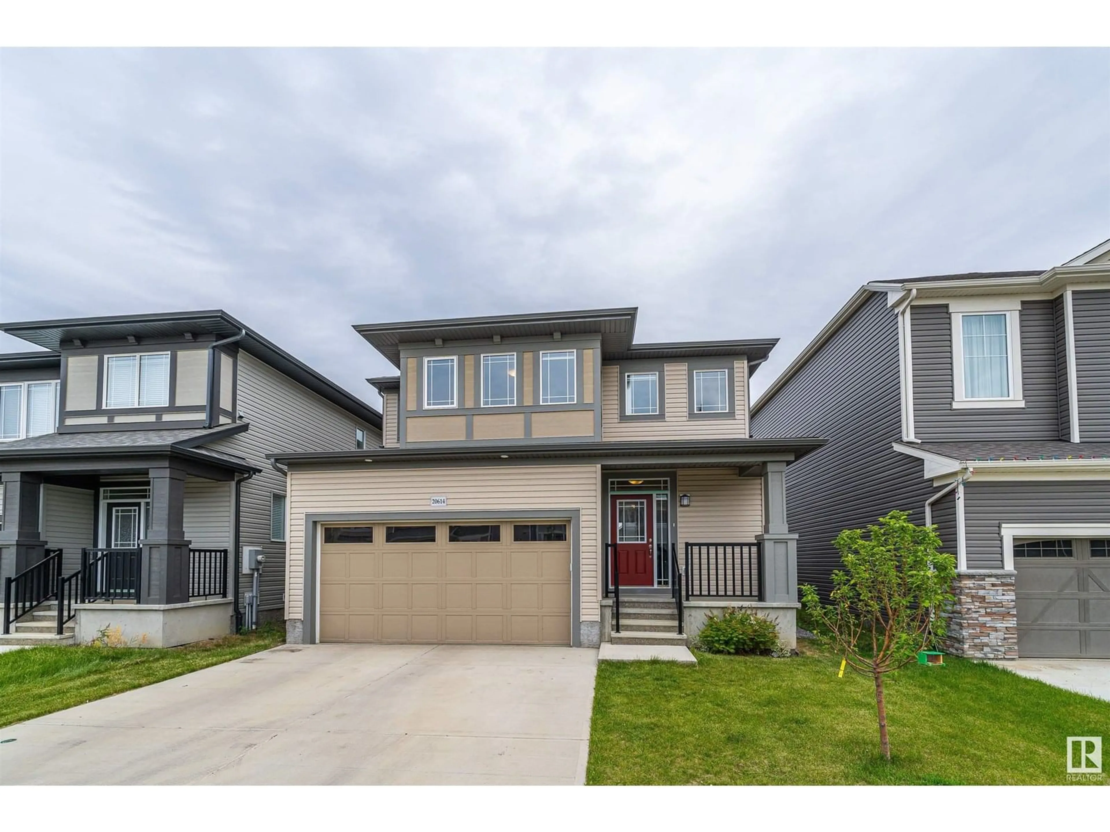 Home with vinyl exterior material, street for 20614 19A AV, Edmonton Alberta T6M1R6