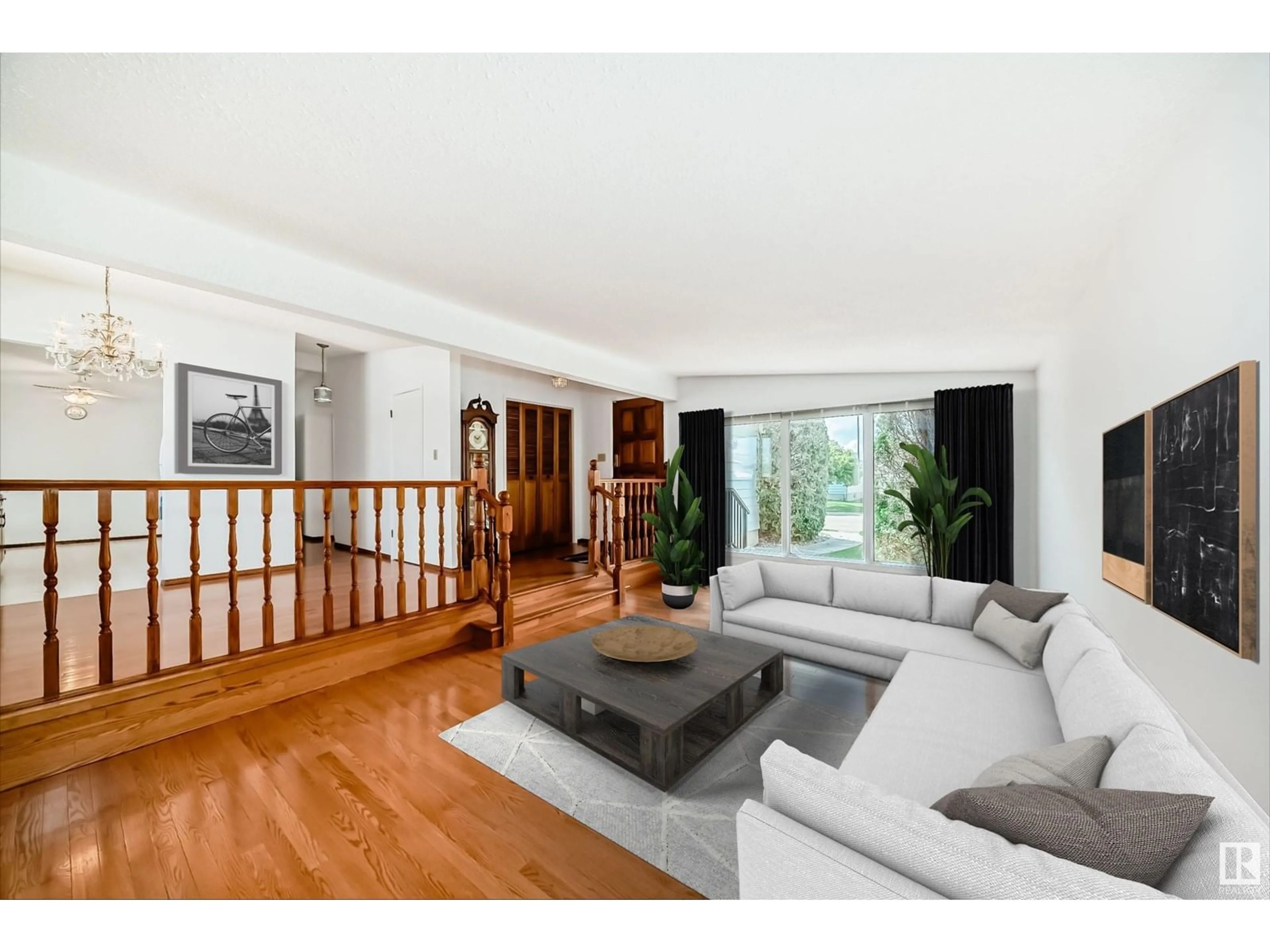 Living room with furniture, wood/laminate floor for NW - 14619 114A ST, Edmonton Alberta T5X1H1