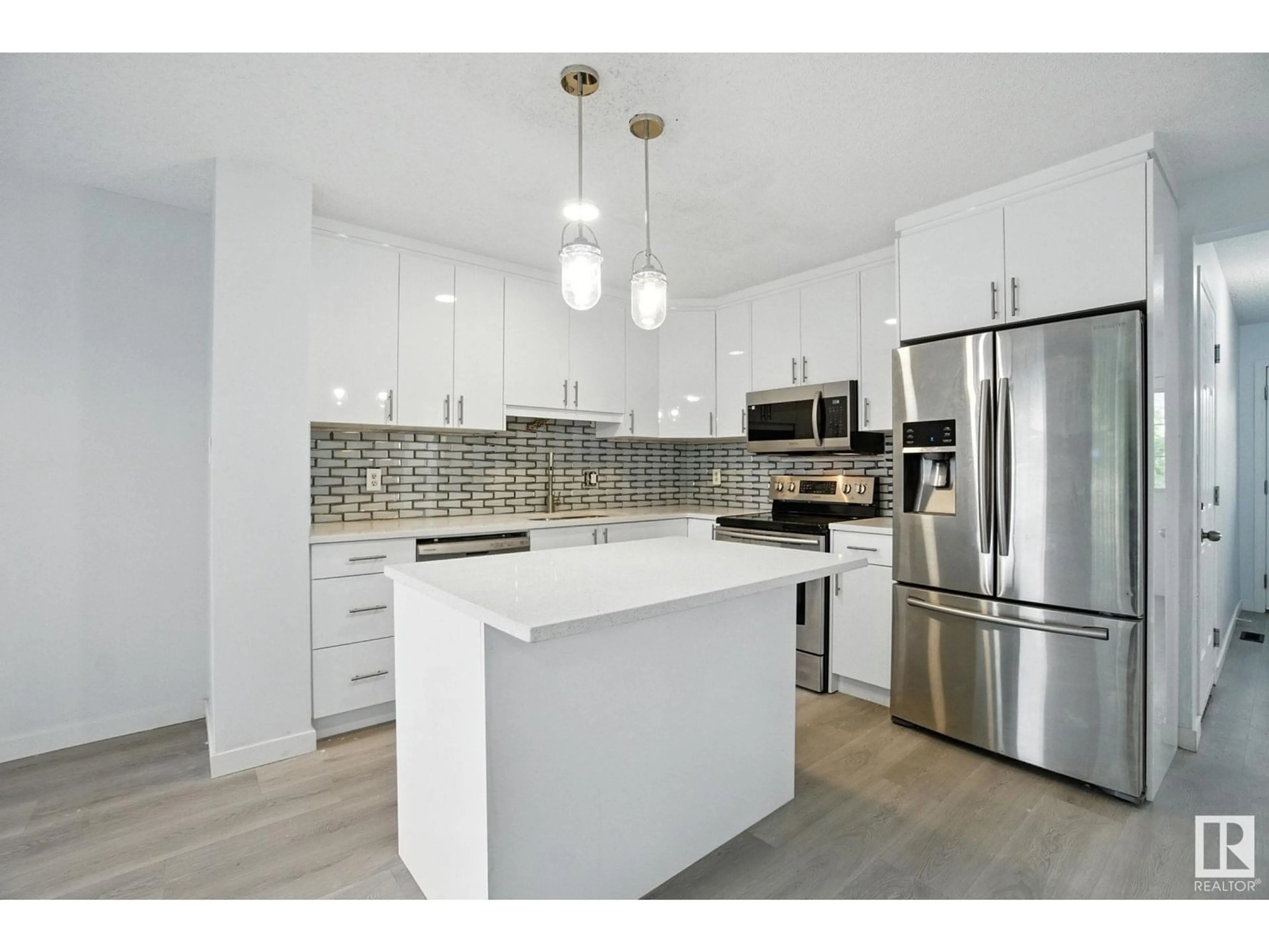 Open concept kitchen, unknown for 7931 7 AV, Edmonton Alberta T6X1N3