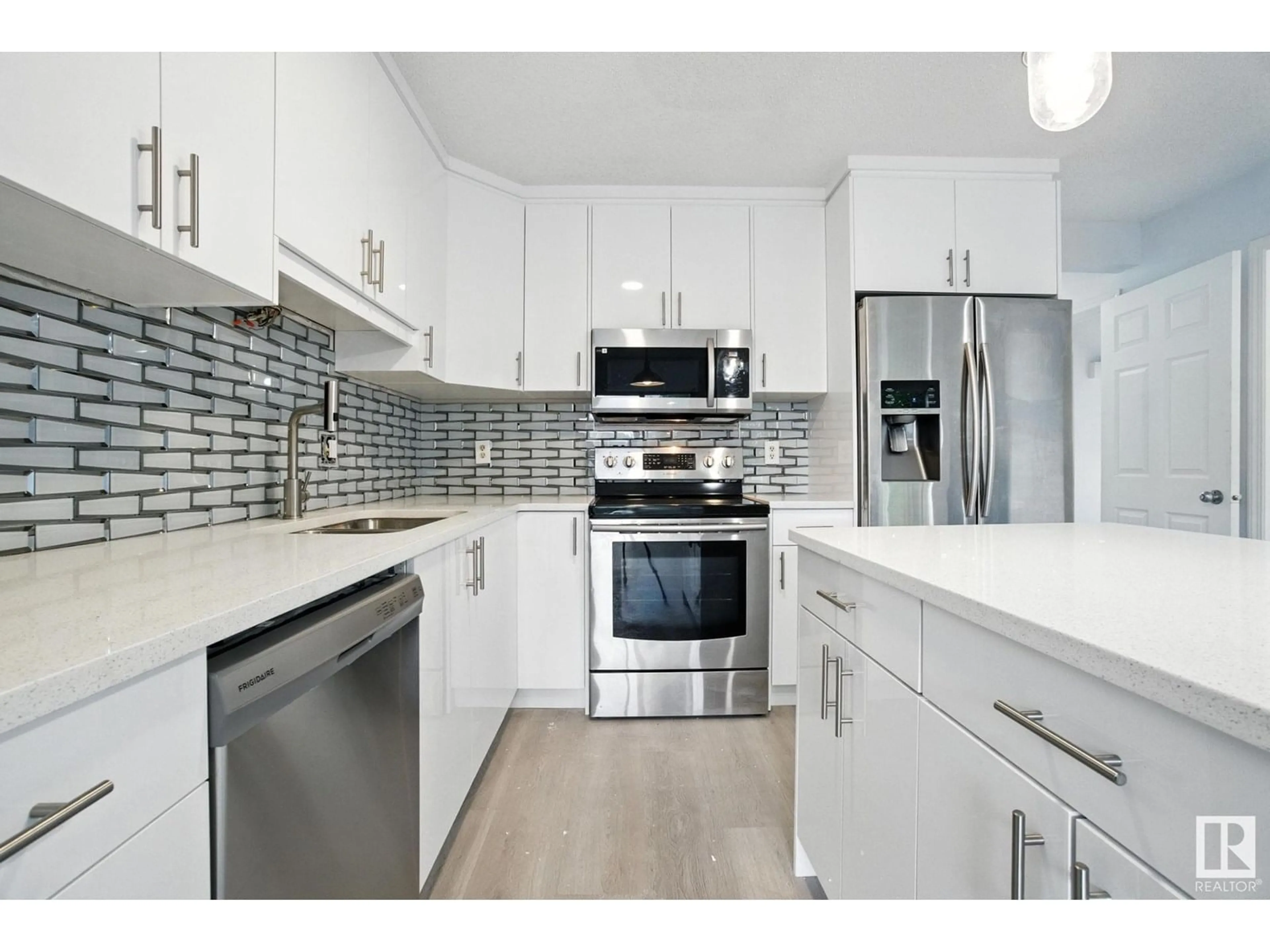 Open concept kitchen, unknown for 7931 7 AV, Edmonton Alberta T6X1N3