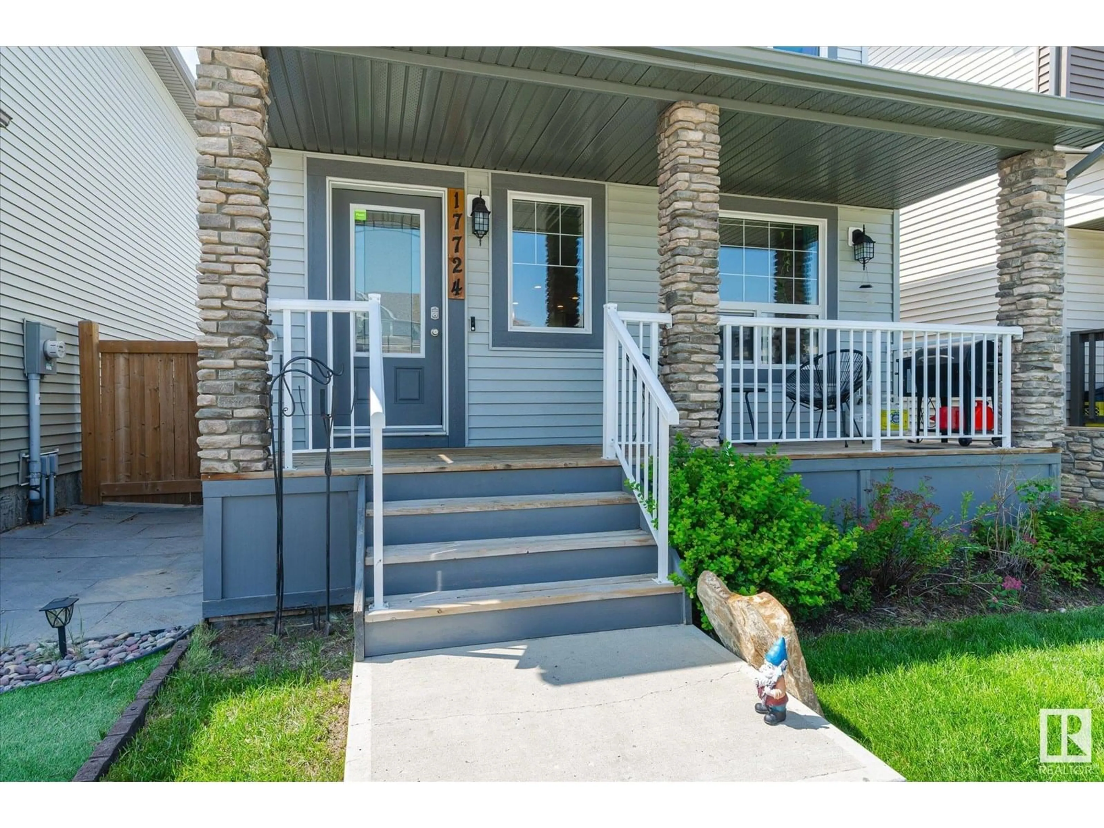 Home with vinyl exterior material, street for NW - 17724 64 ST, Edmonton Alberta T5Y3X3