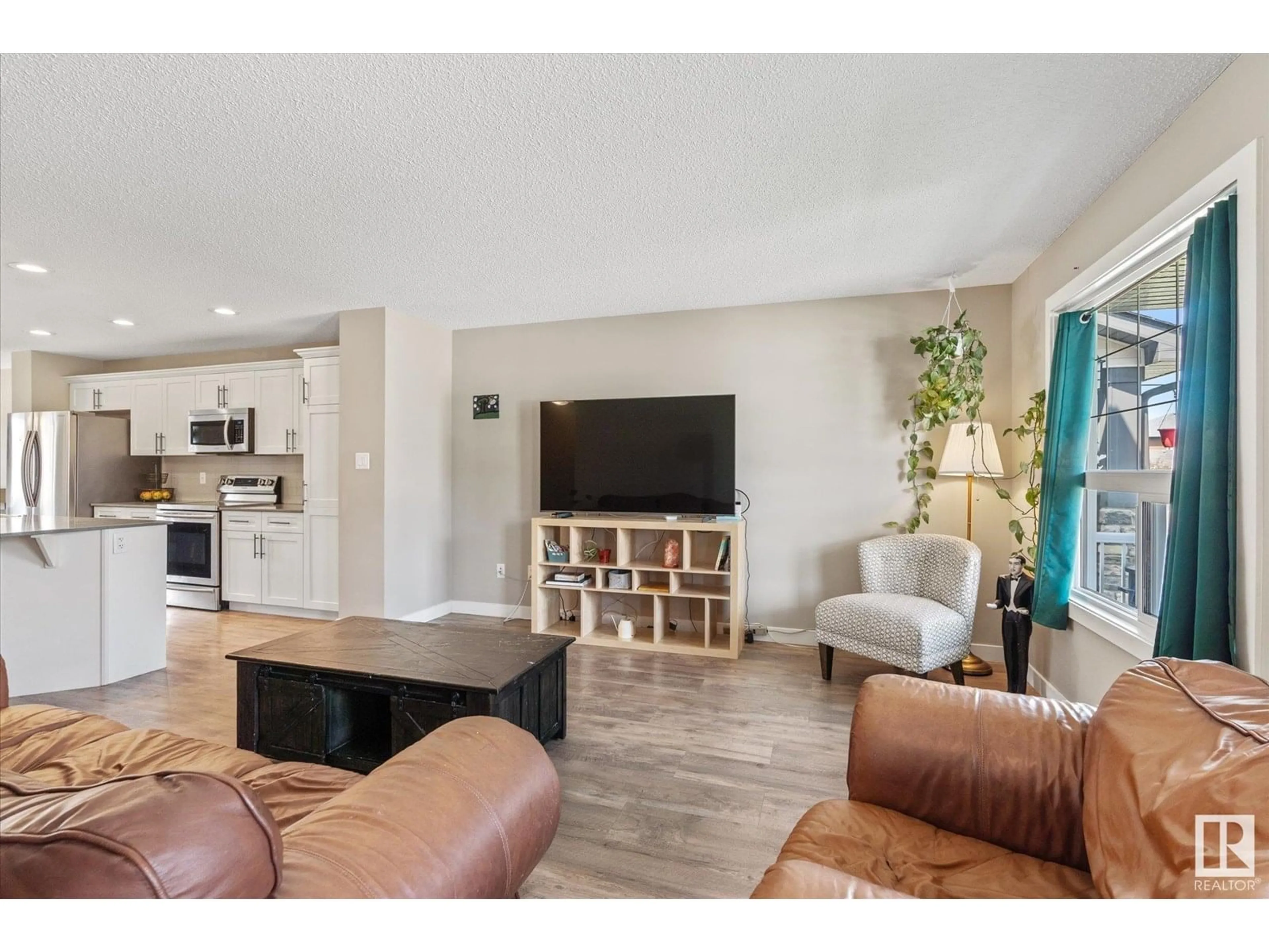 Living room with furniture, unknown for NW - 17724 64 ST, Edmonton Alberta T5Y3X3