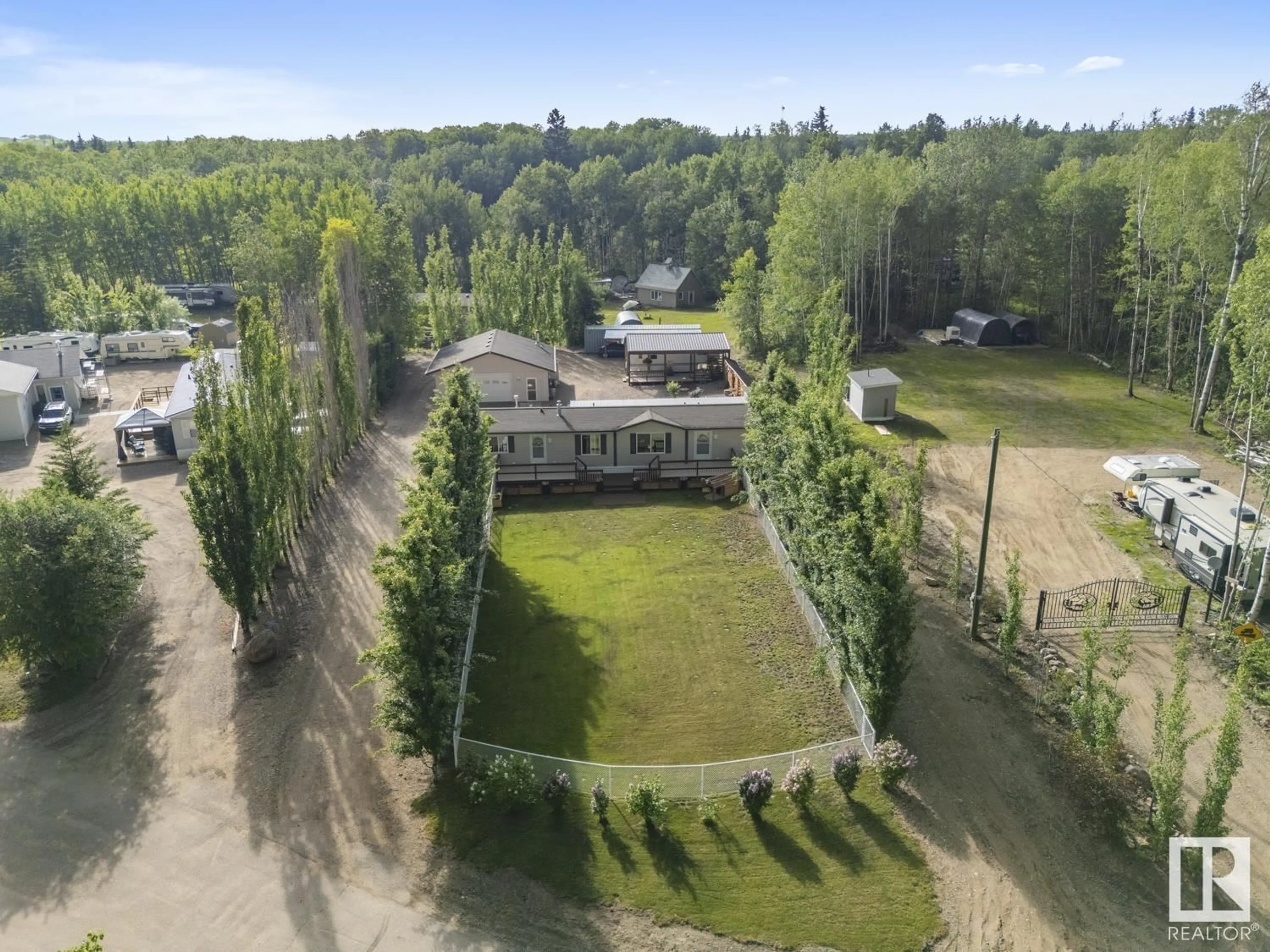 A pic from outside/outdoor area/front of a property/back of a property/a pic from drone, unknown for 206 TWP RD 650 TWP RD, Rural Bonnyville M.D. Alberta T9M1N2