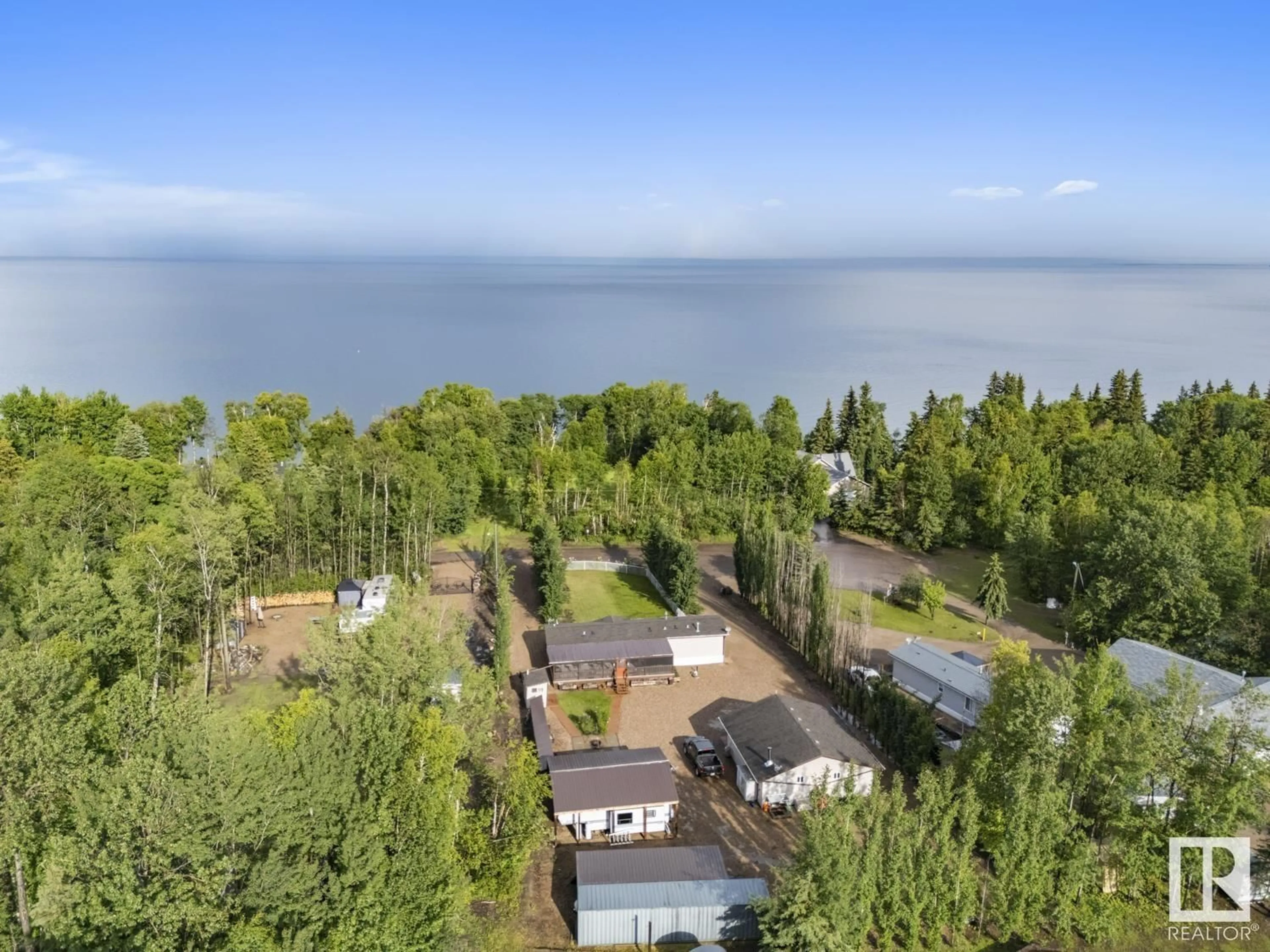 A pic from outside/outdoor area/front of a property/back of a property/a pic from drone, water/lake/river/ocean view for 206 TWP RD 650 TWP RD, Rural Bonnyville M.D. Alberta T9M1N2