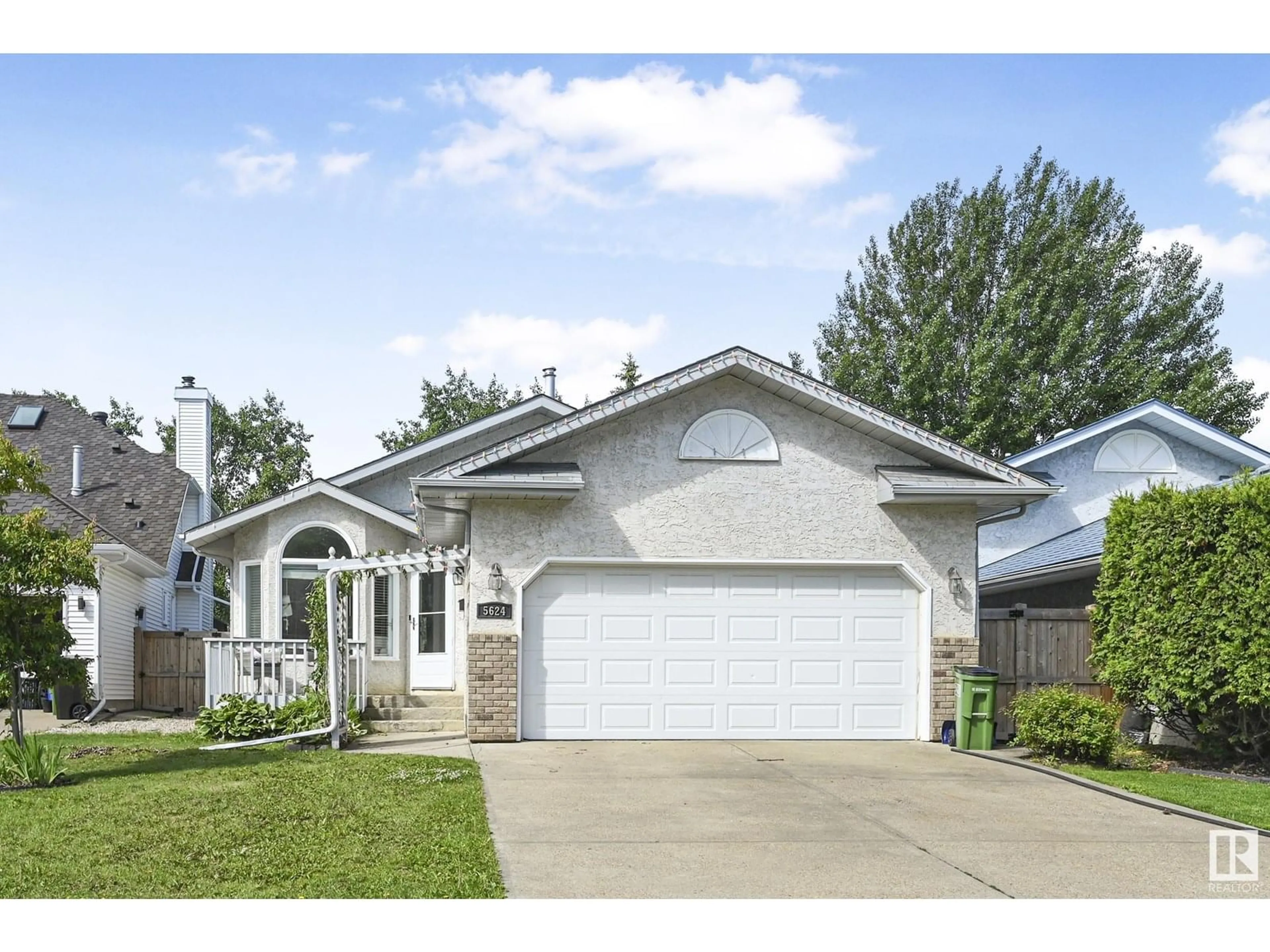 Home with vinyl exterior material, street for NW - 5624 189A ST, Edmonton Alberta T6M2G7