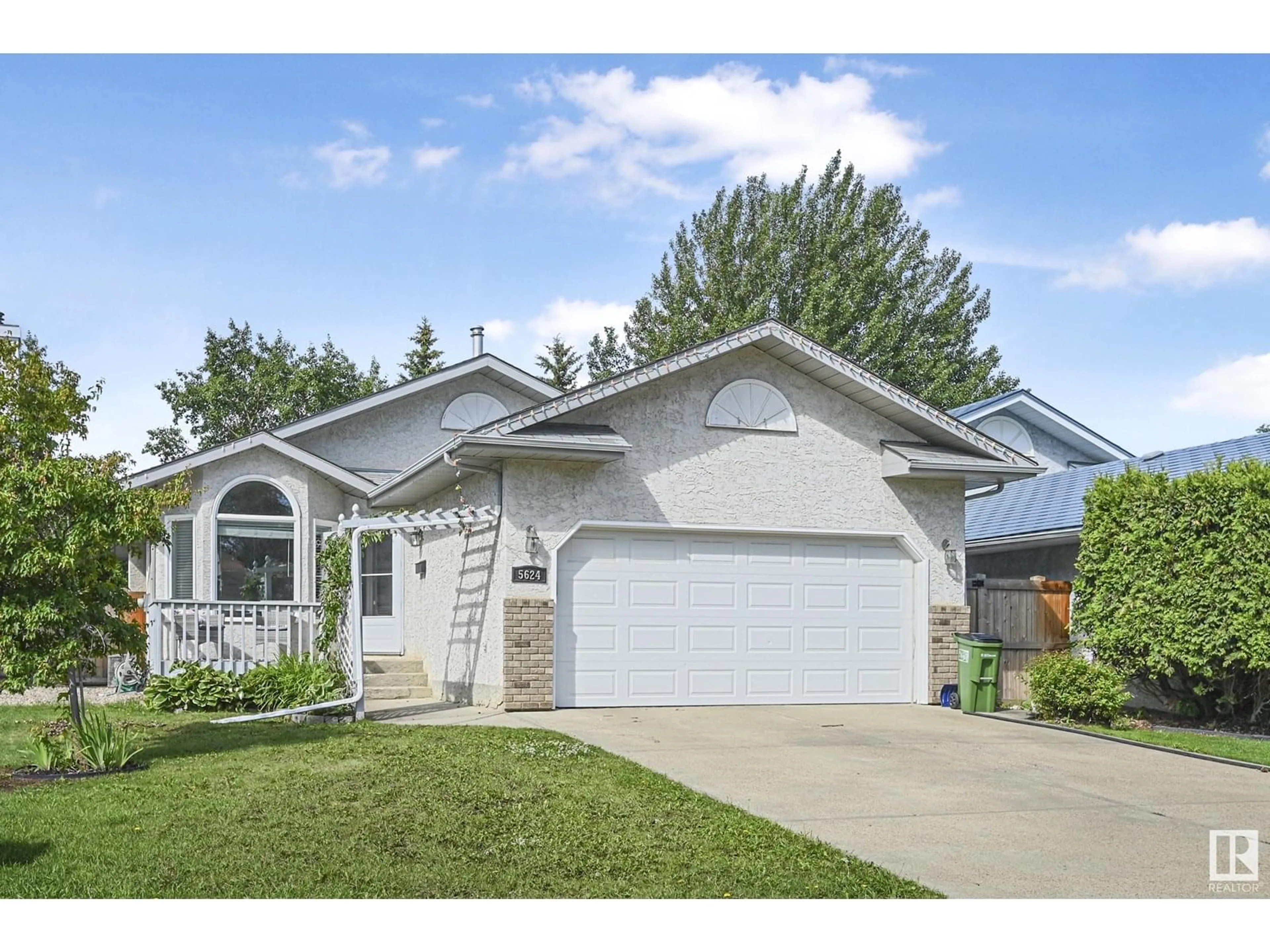 Home with vinyl exterior material, street for NW - 5624 189A ST, Edmonton Alberta T6M2G7