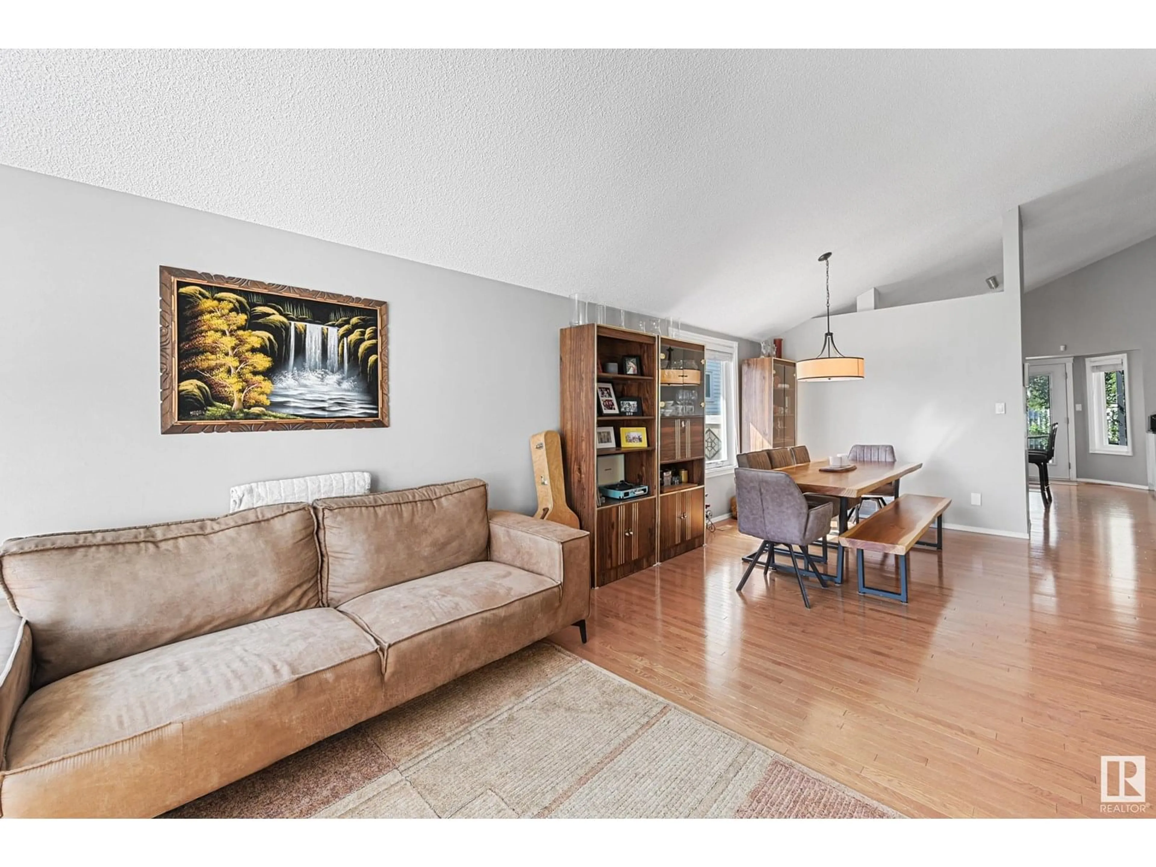 Living room with furniture, wood/laminate floor for NW - 5624 189A ST, Edmonton Alberta T6M2G7