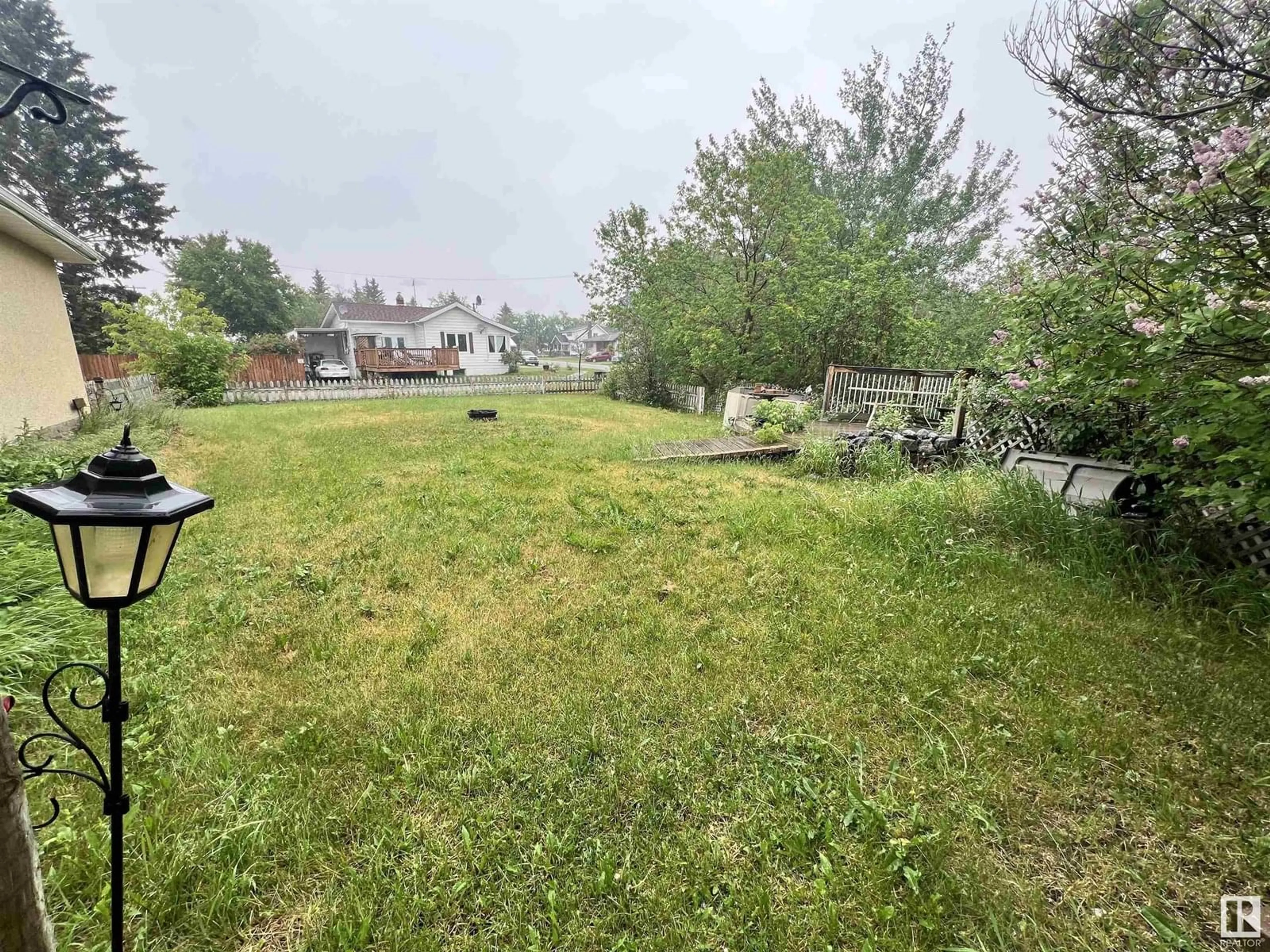 A pic from outside/outdoor area/front of a property/back of a property/a pic from drone, water/lake/river/ocean view for 4803 50B AV, Waskatenau Alberta T0A3P0