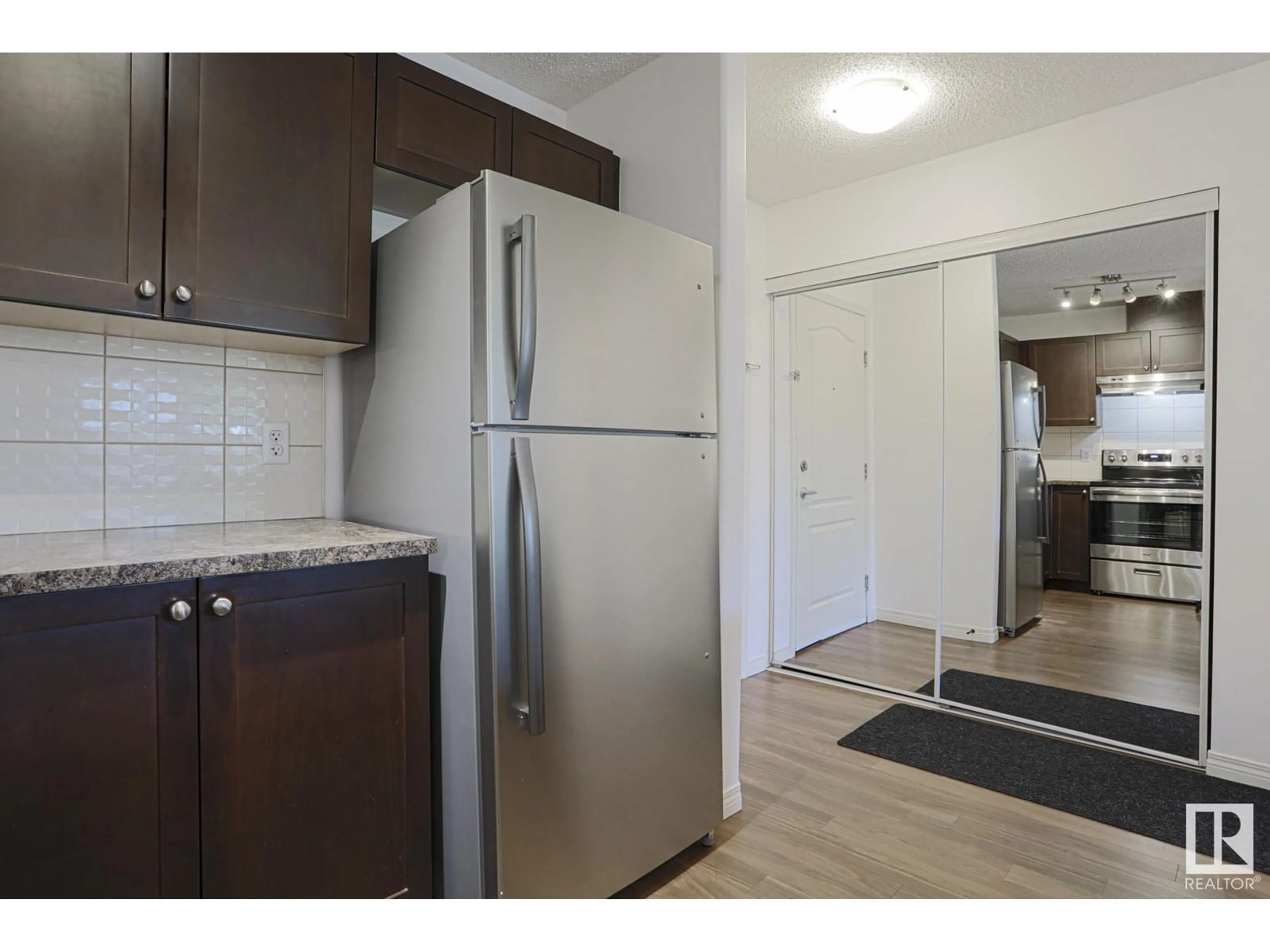Standard kitchen, wood/laminate floor for #145 - 1520 HAMMOND GATE, Edmonton Alberta T6M0J4
