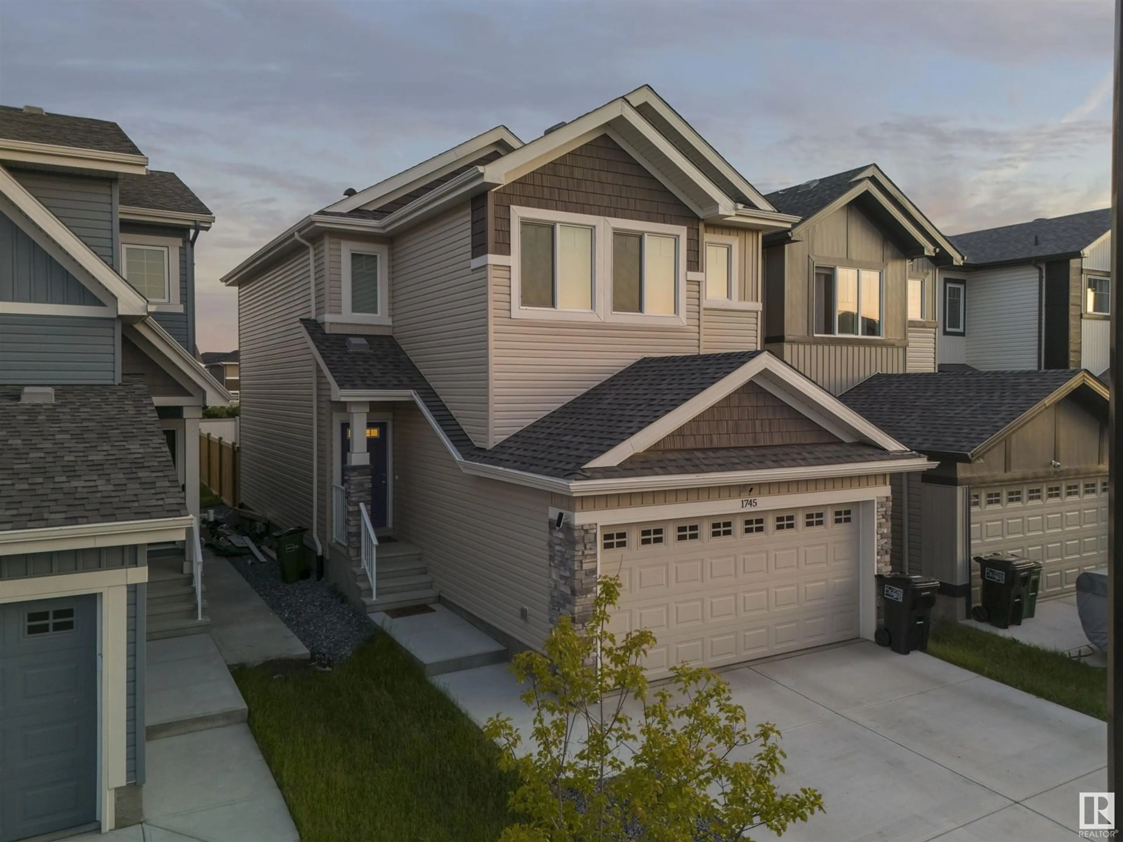 Home with vinyl exterior material, street for 1745 ERKER WY, Edmonton Alberta T6M1J2