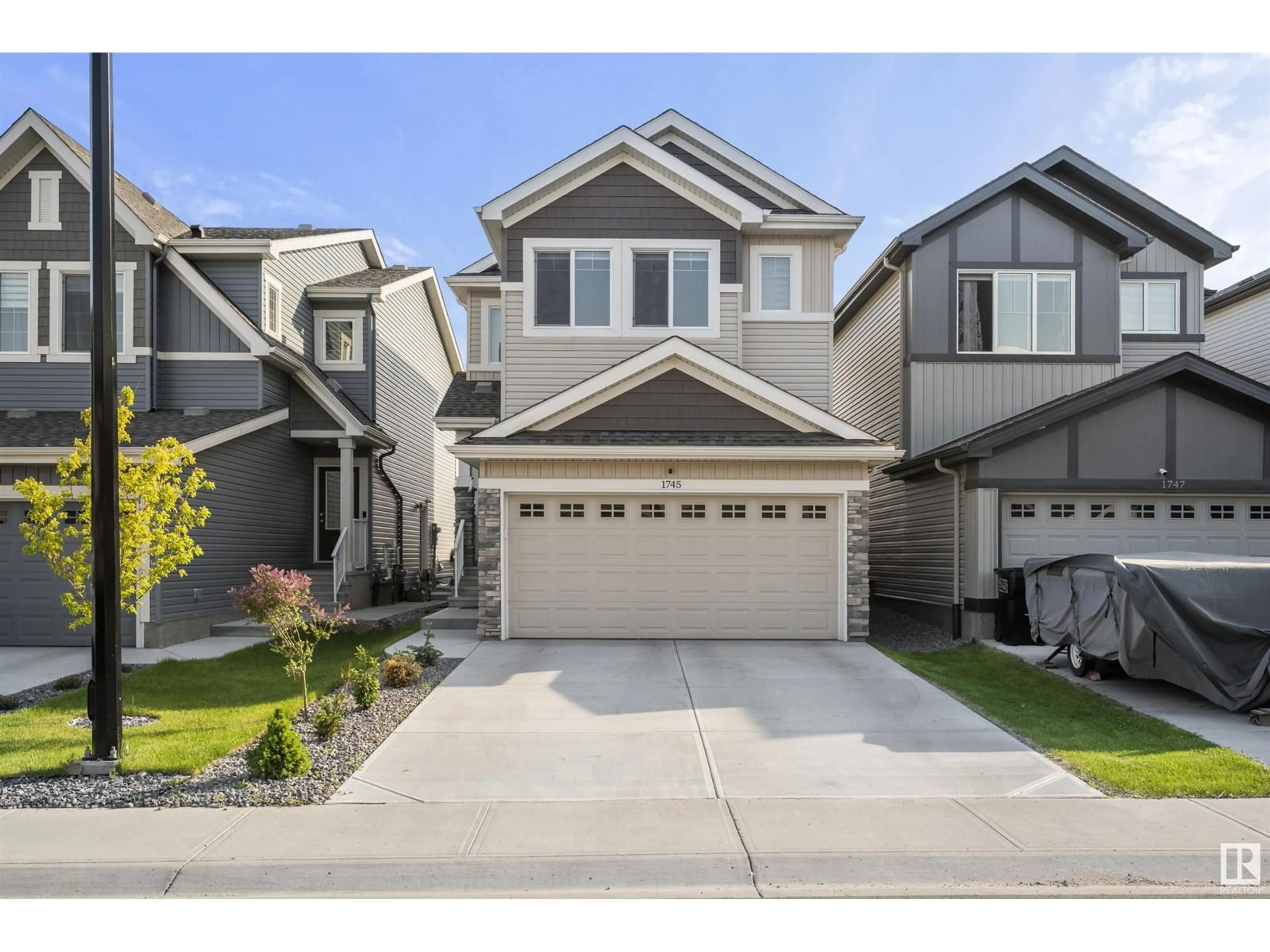 Home with vinyl exterior material, street for 1745 ERKER WY, Edmonton Alberta T6M1J2
