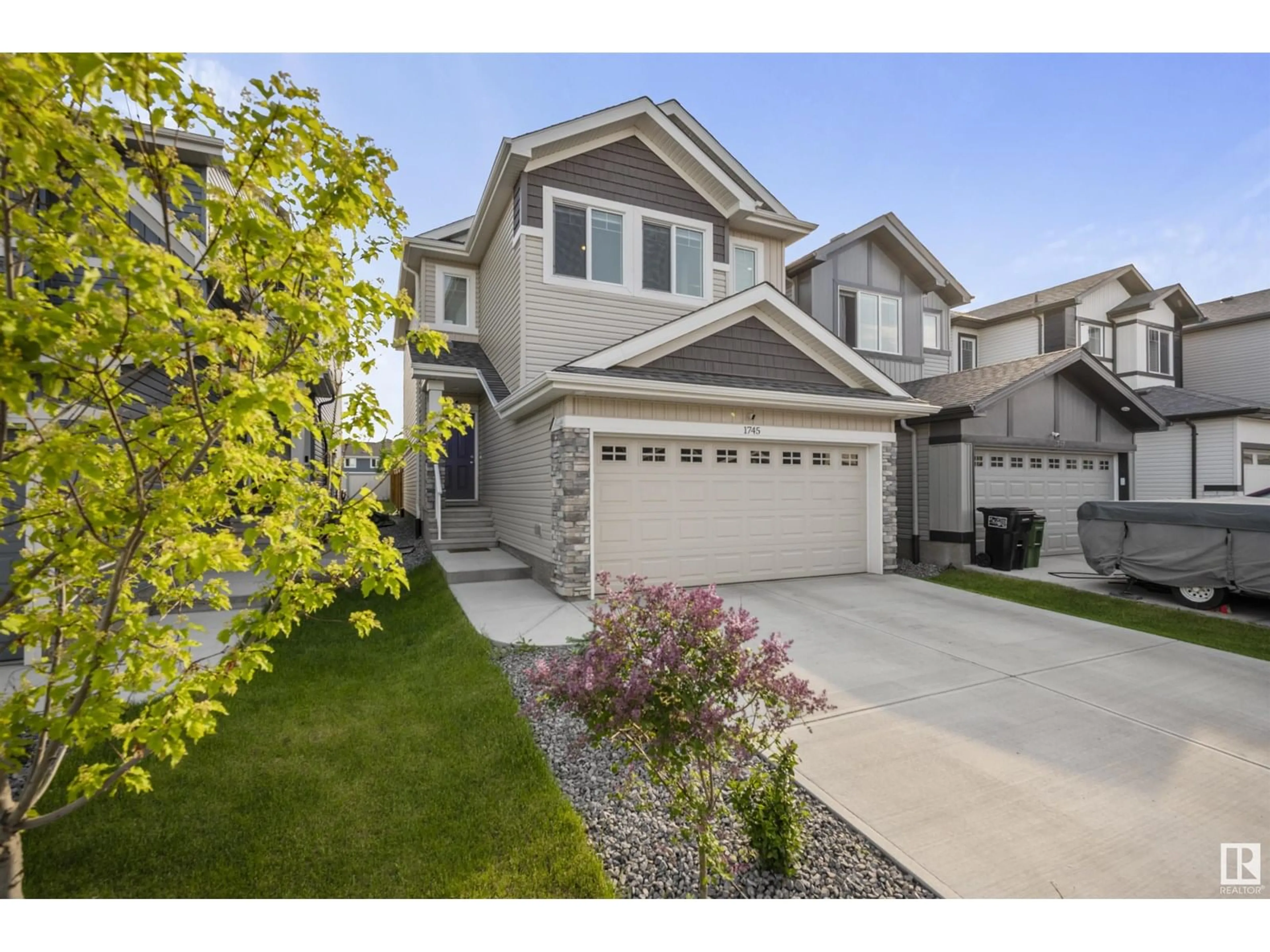 Home with vinyl exterior material, street for 1745 ERKER WY, Edmonton Alberta T6M1J2