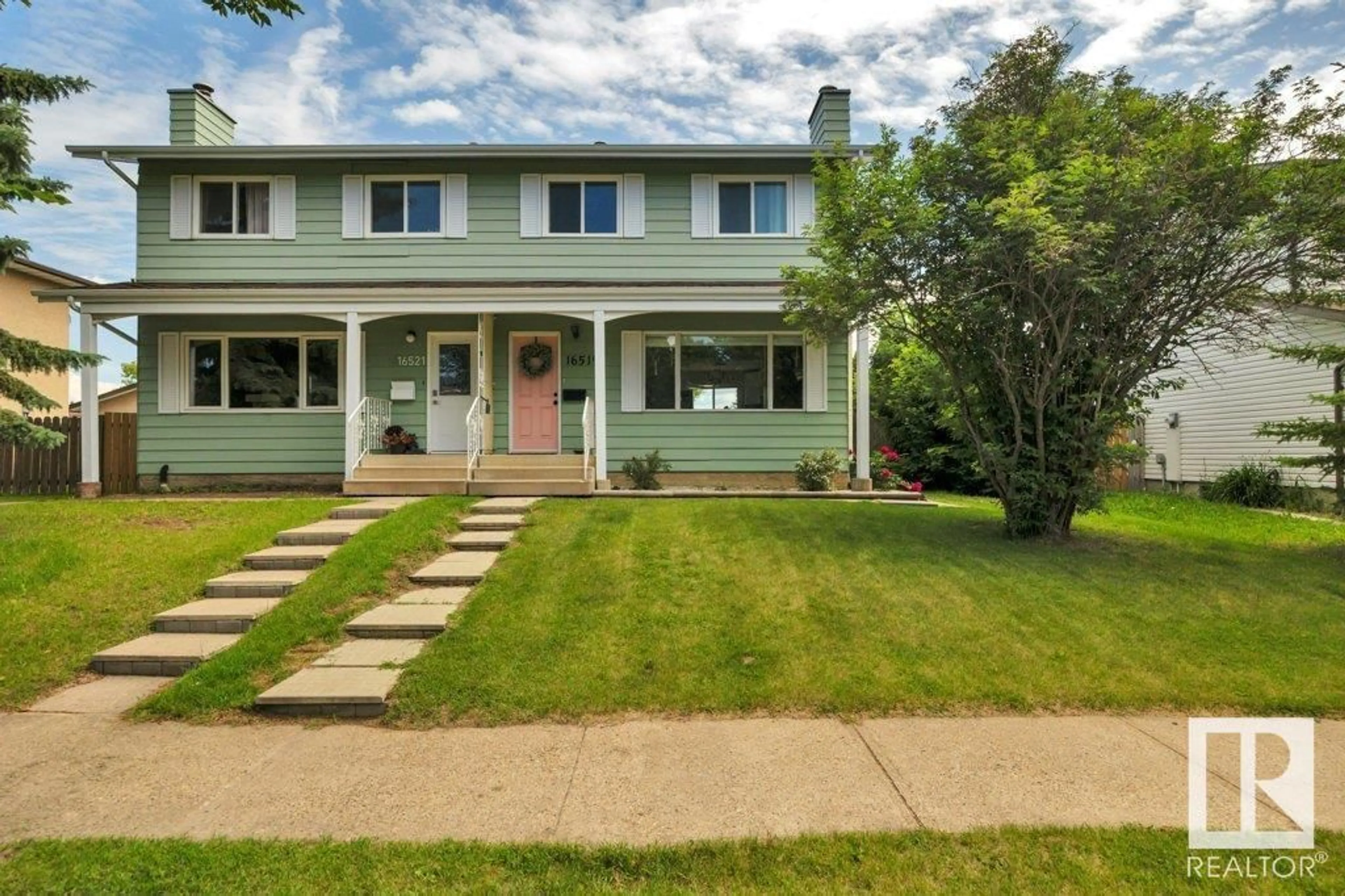 Home with vinyl exterior material, street for NW - 16519 115 ST, Edmonton Alberta T5X3V3