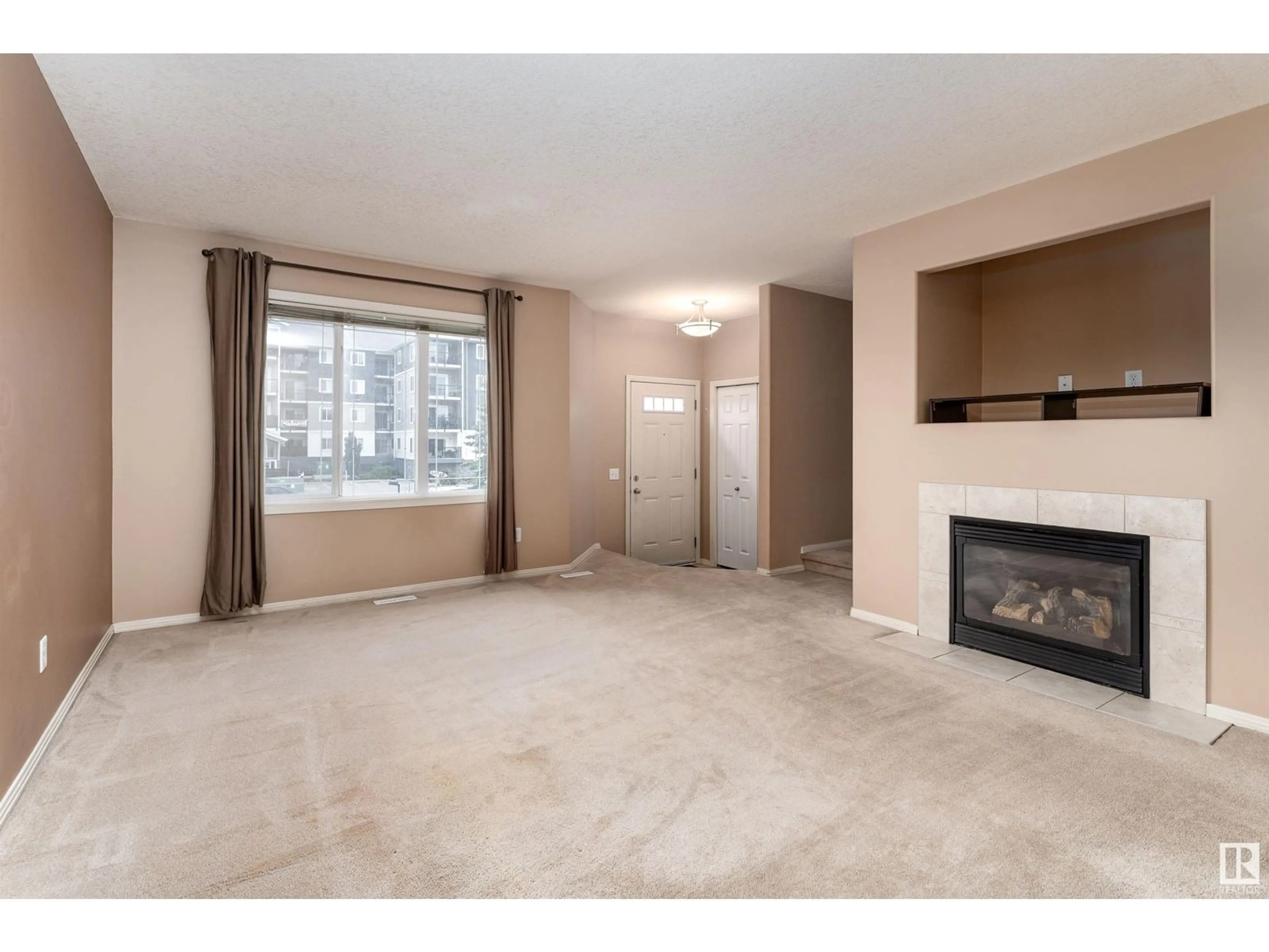Living room with furniture, carpet floor for #3 - 12930 140 AV, Edmonton Alberta T6V0C4