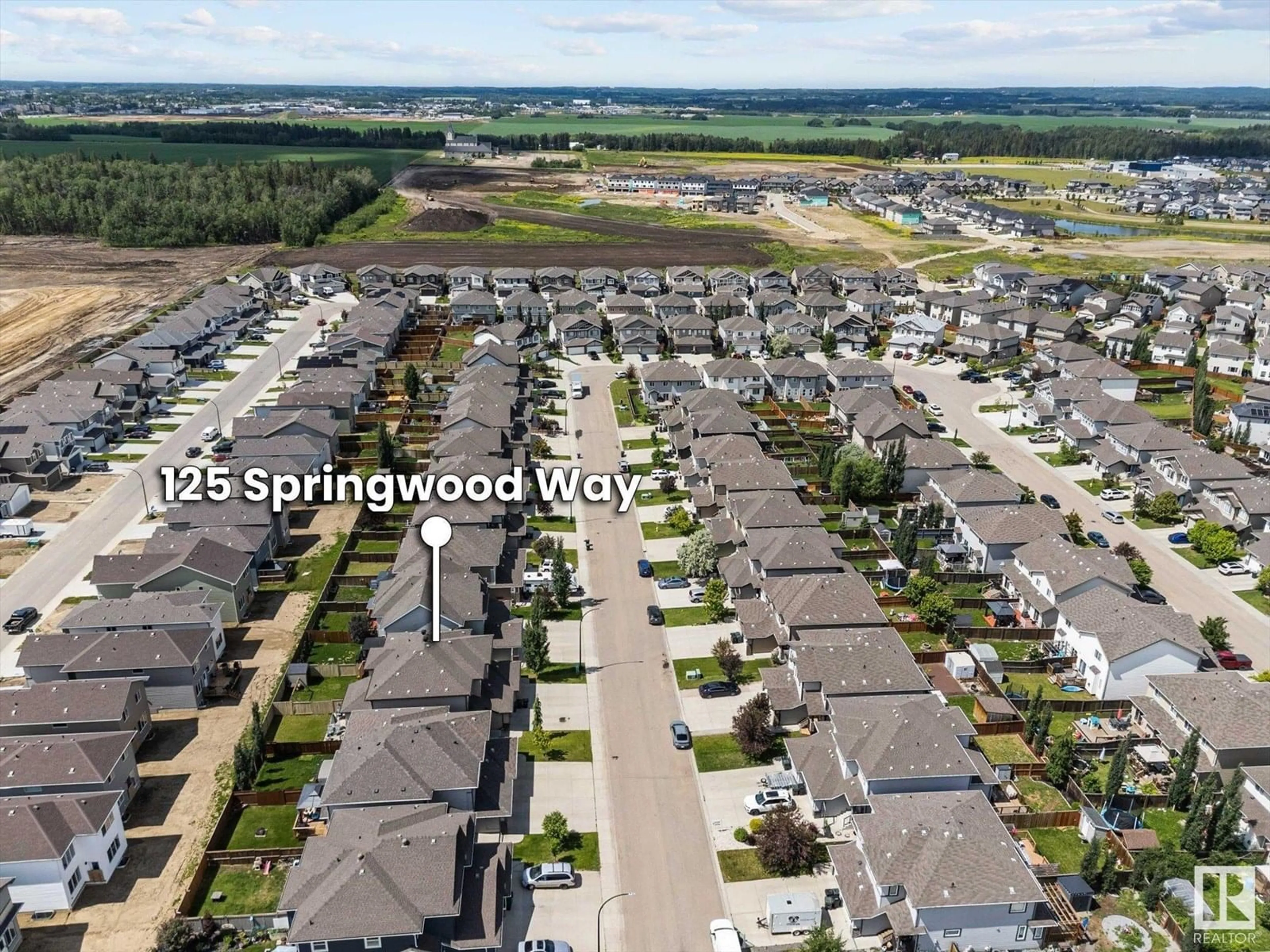 A pic from outside/outdoor area/front of a property/back of a property/a pic from drone, street for 125 SPRINGWOOD WY, Spruce Grove Alberta T7X0S7