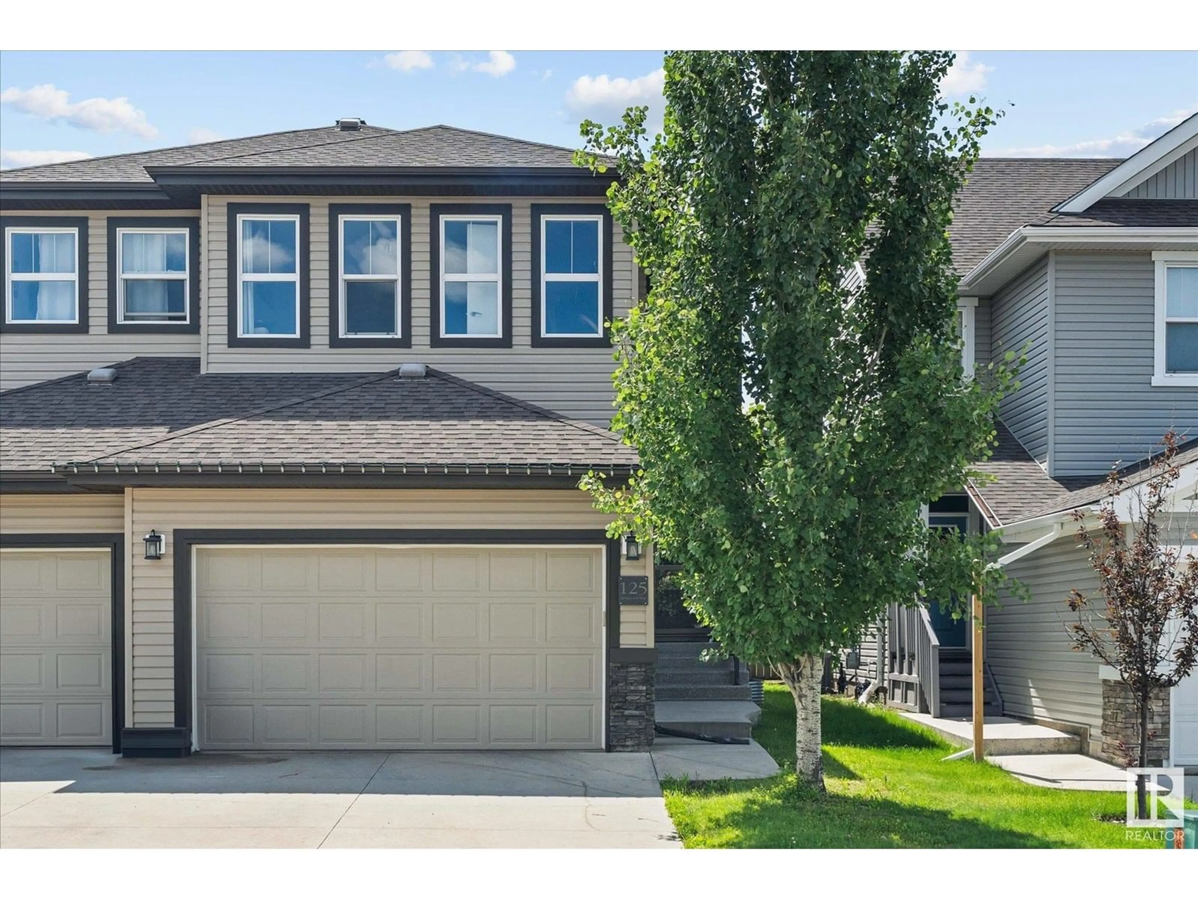 Home with vinyl exterior material, street for 125 SPRINGWOOD WY, Spruce Grove Alberta T7X0S7