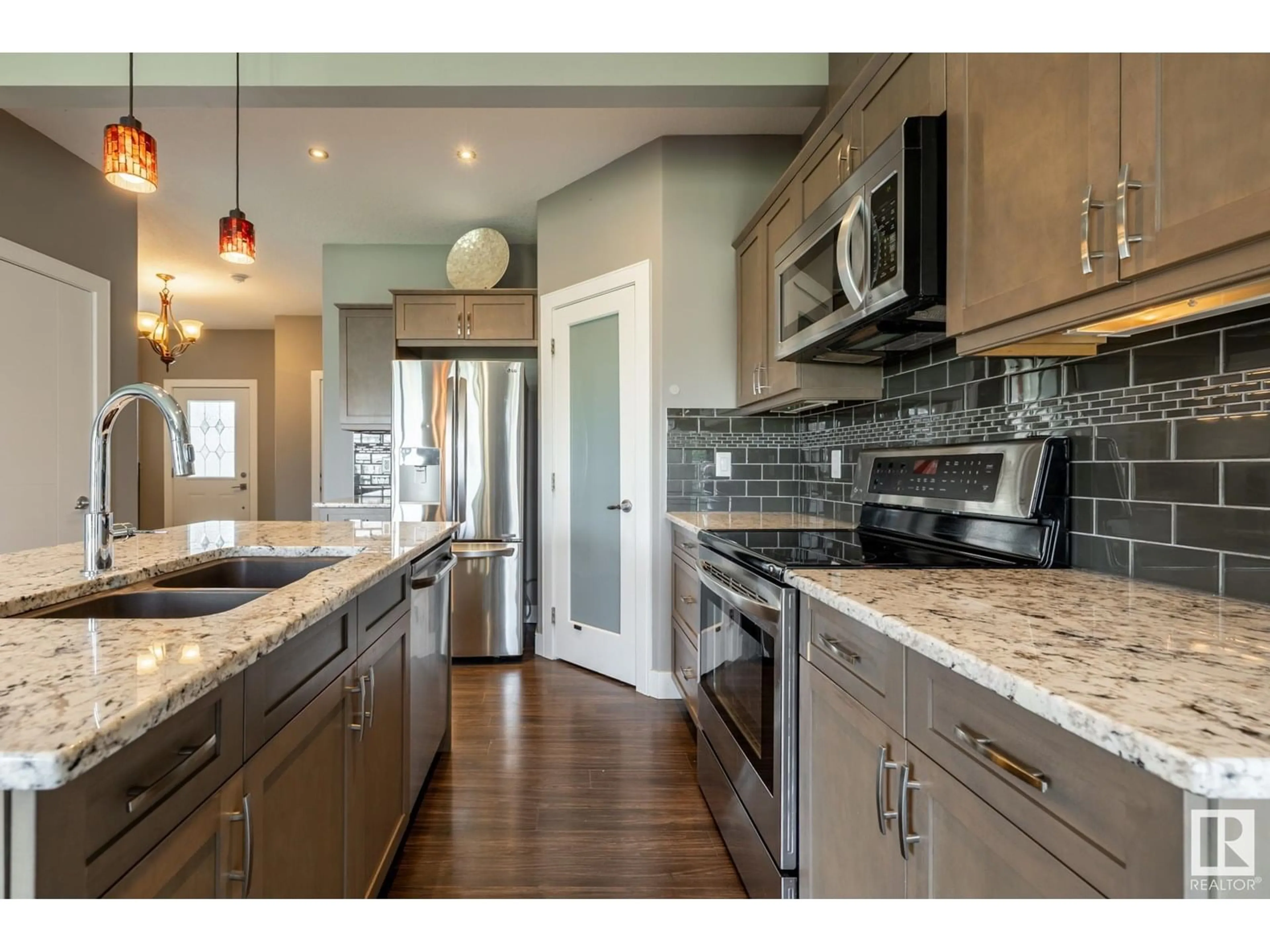 Open concept kitchen, ceramic/tile floor for 324 GENESIS VI, Stony Plain Alberta T7Z1A8