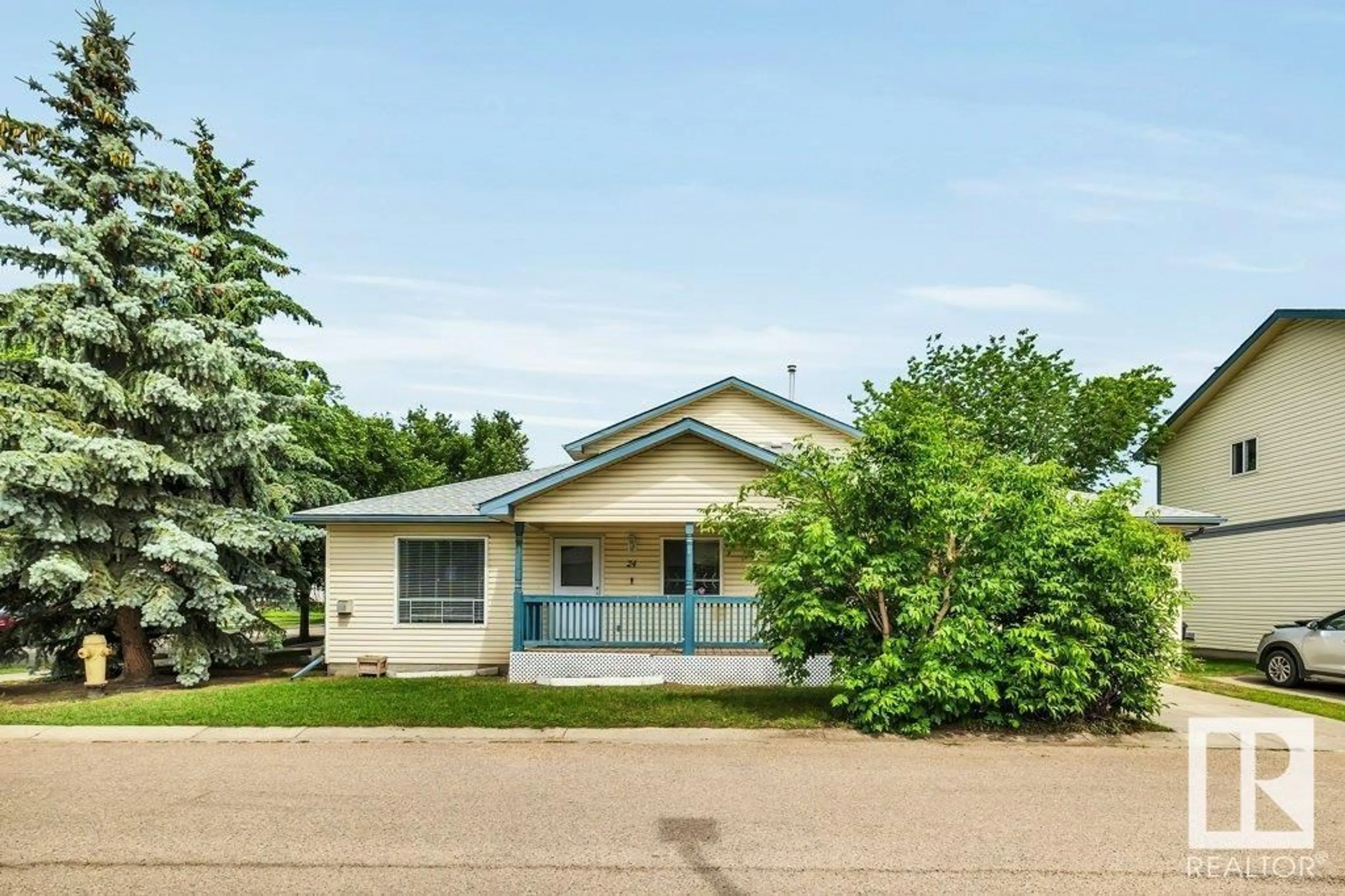 Home with vinyl exterior material, street for #24 - 10909 106 ST NW, Edmonton Alberta T5H4M7