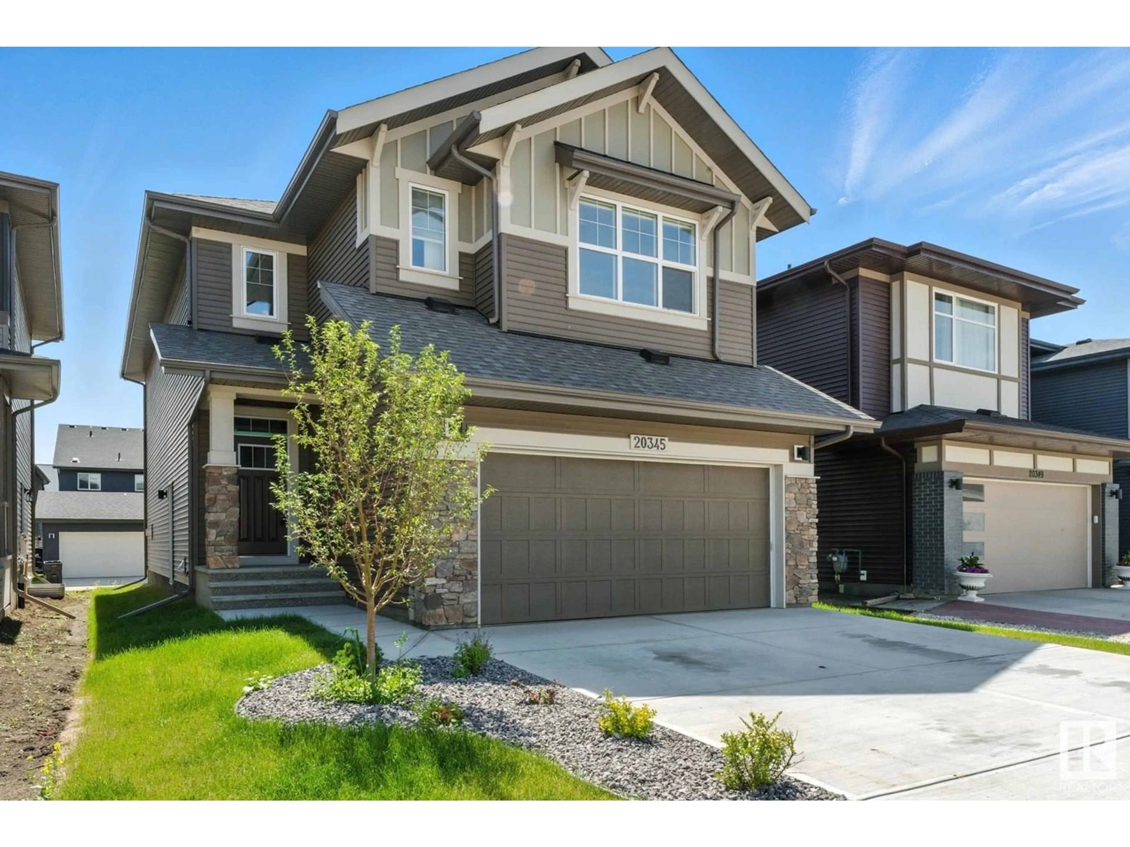 Home with vinyl exterior material, street for 20345 25A AV, Edmonton Alberta T6M1N8