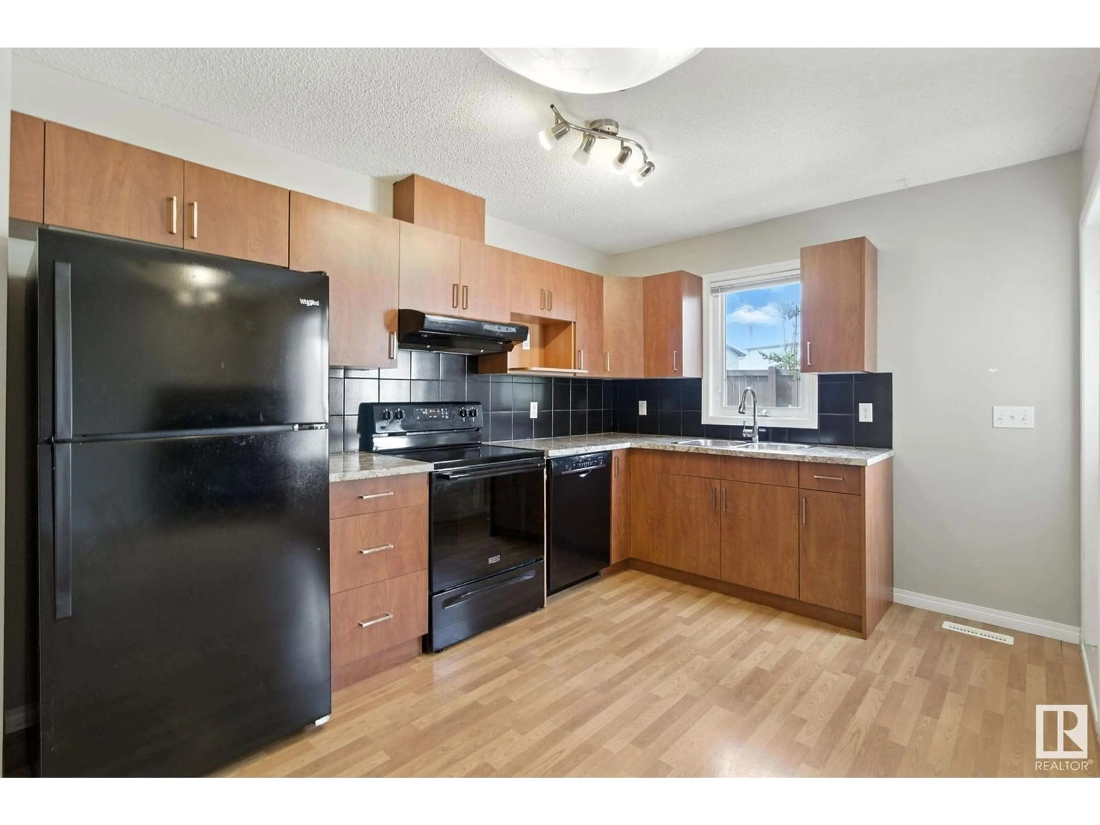 Standard kitchen, wood/laminate floor for #4 - 171 BRINTNELL BV, Edmonton Alberta T5Y0C6